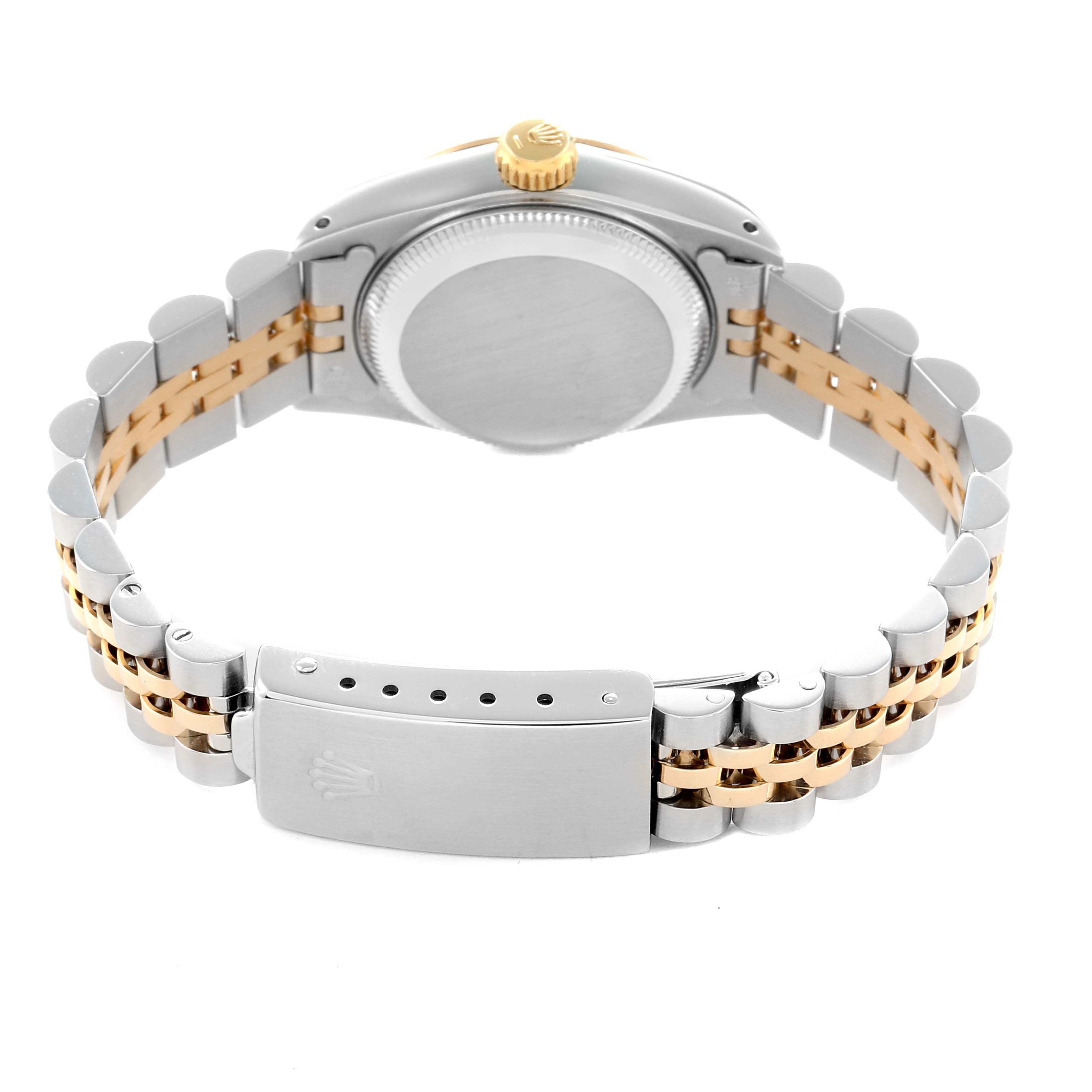 The Rolex Datejust 69173 Women
s Steel and Gold (two tone) Champagne Dial watch is shown from the rear, displaying the case back, gold crown, and two-tone bracelet with clasp.