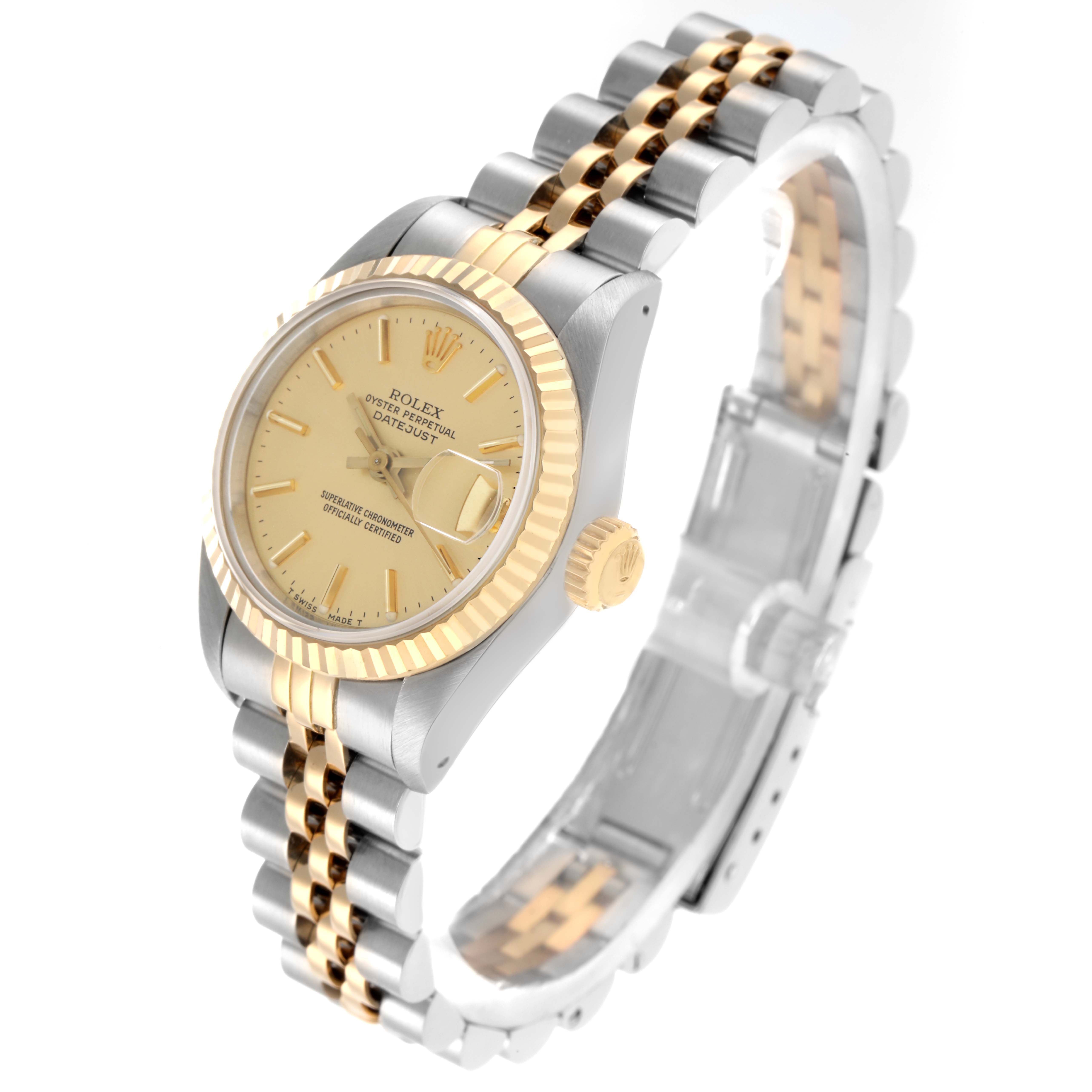 The Rolex Datejust 69173 Women
s Steel and Gold (two tone) Champagne Dial watch is shown at a three-quarter angle, displaying the face, fluted bezel, and Jubilee bracelet.