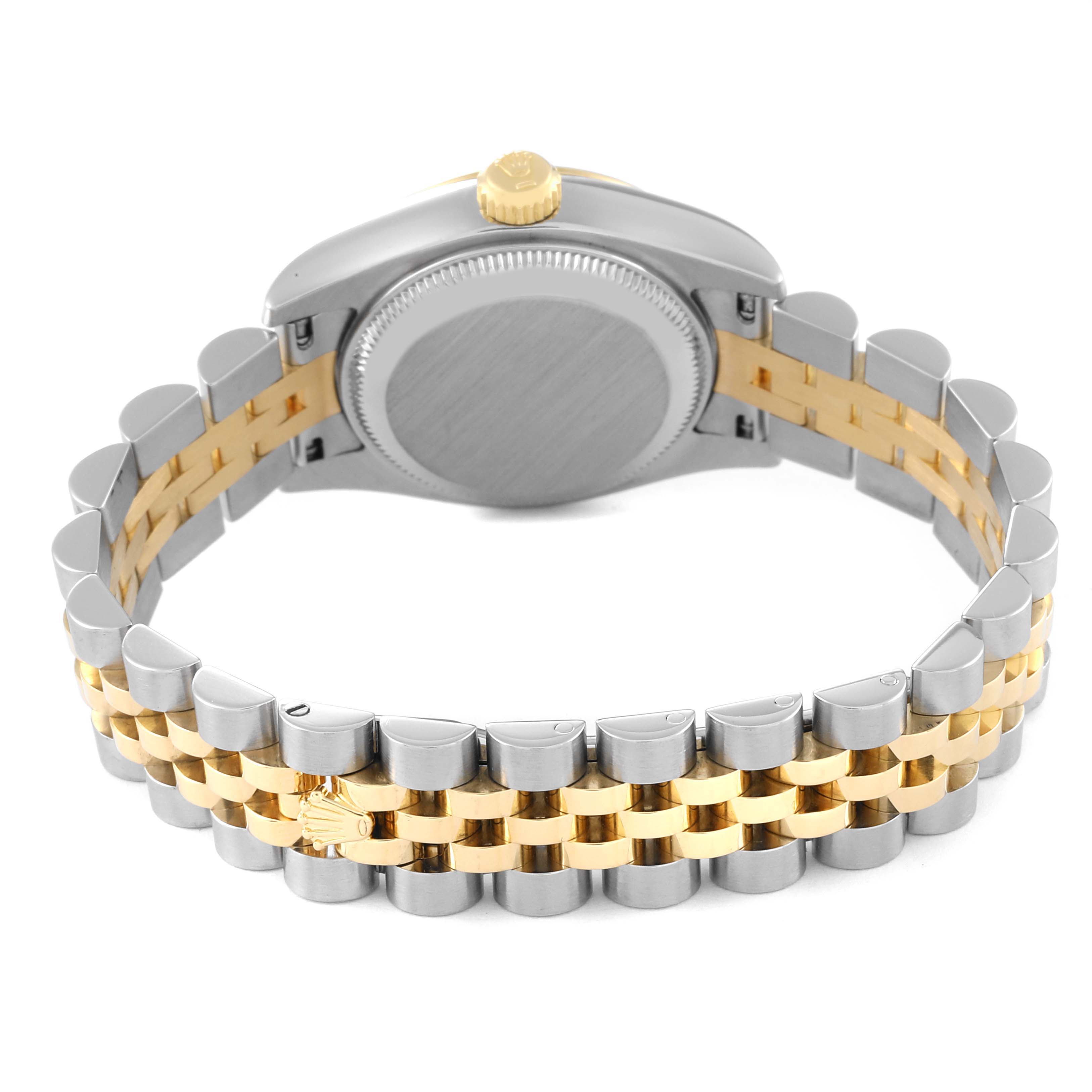 The image shows the back of the Rolex Datejust 179163 Women's Steel and Gold (two tone) White Dial 179163 Women's Steel and Gold (two tone) White Dial watch, focusing on the two-tone metal bracelet and closed case back.