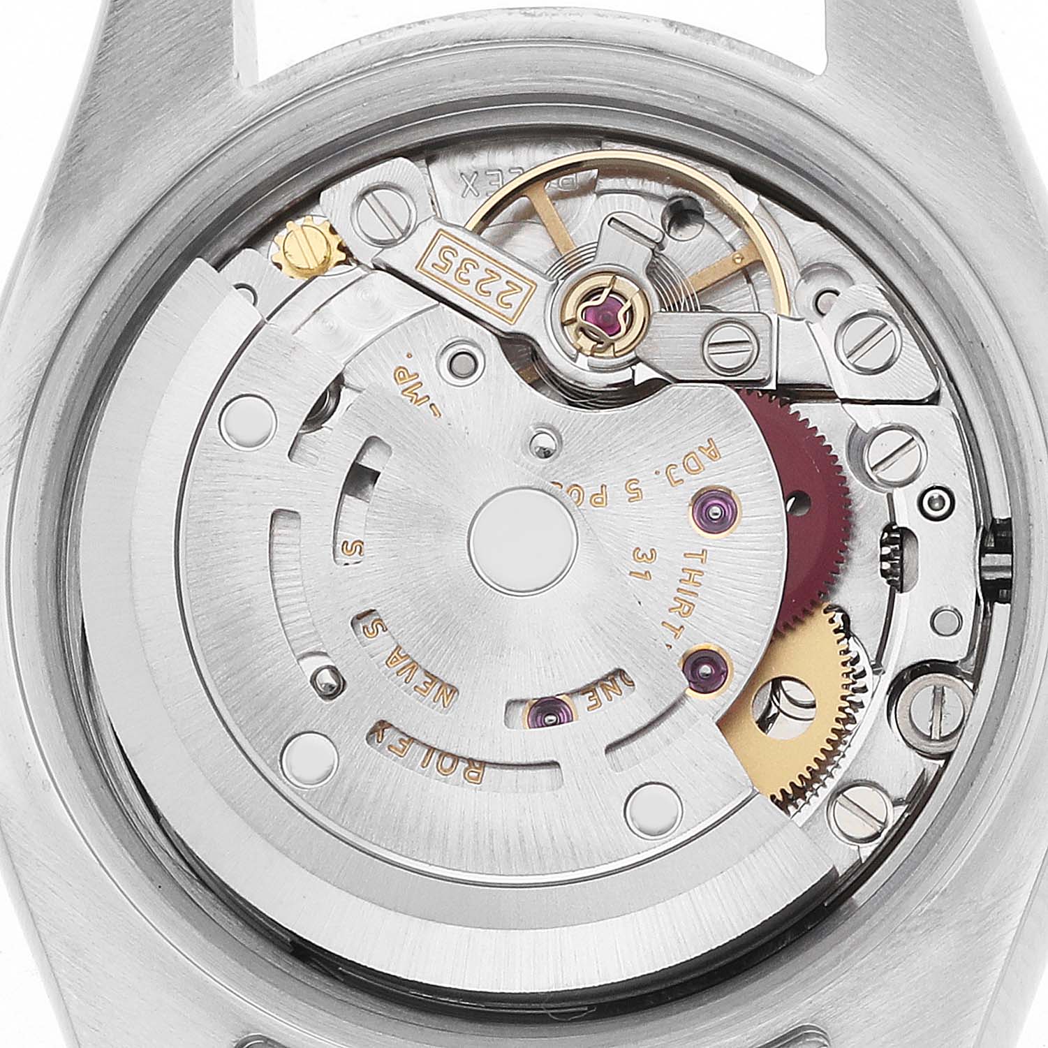 The image shows a close-up of the Rolex Datejust 179173 Women
s Stainless Steel Champagne Dial watch
s movement, focusing on its intricate mechanical components.