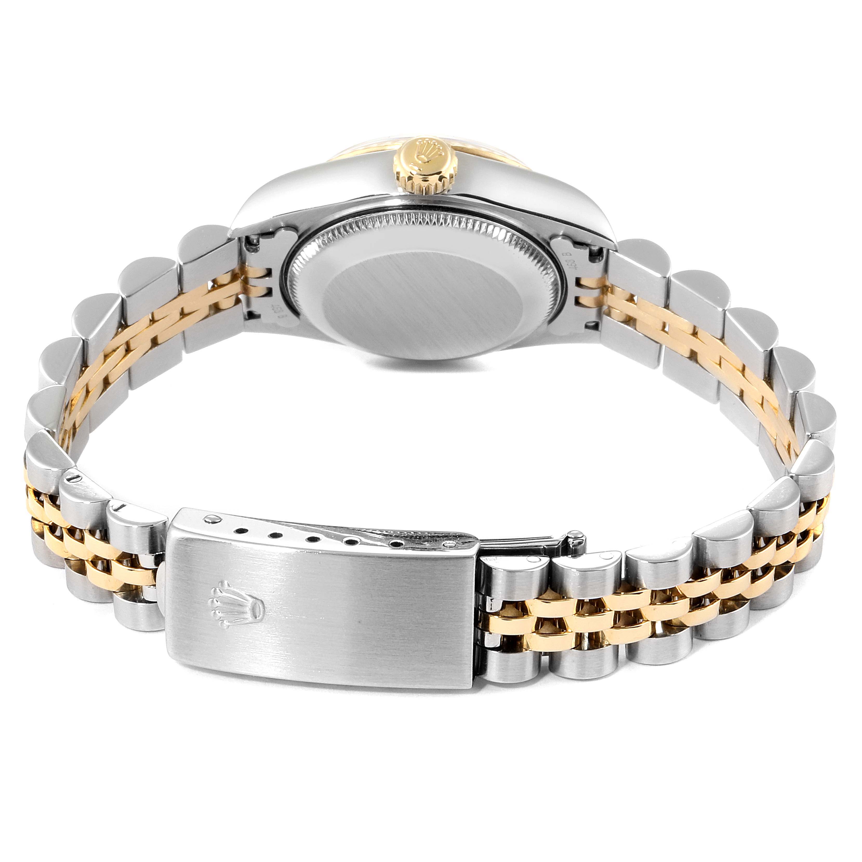 The image shows the back view and clasp of the Rolex Datejust 69173 Women's Steel and Gold (two tone) White Dial 69173 Women's Steel and Gold (two tone) White Dial watch, highlighting its two-tone bracelet and case.