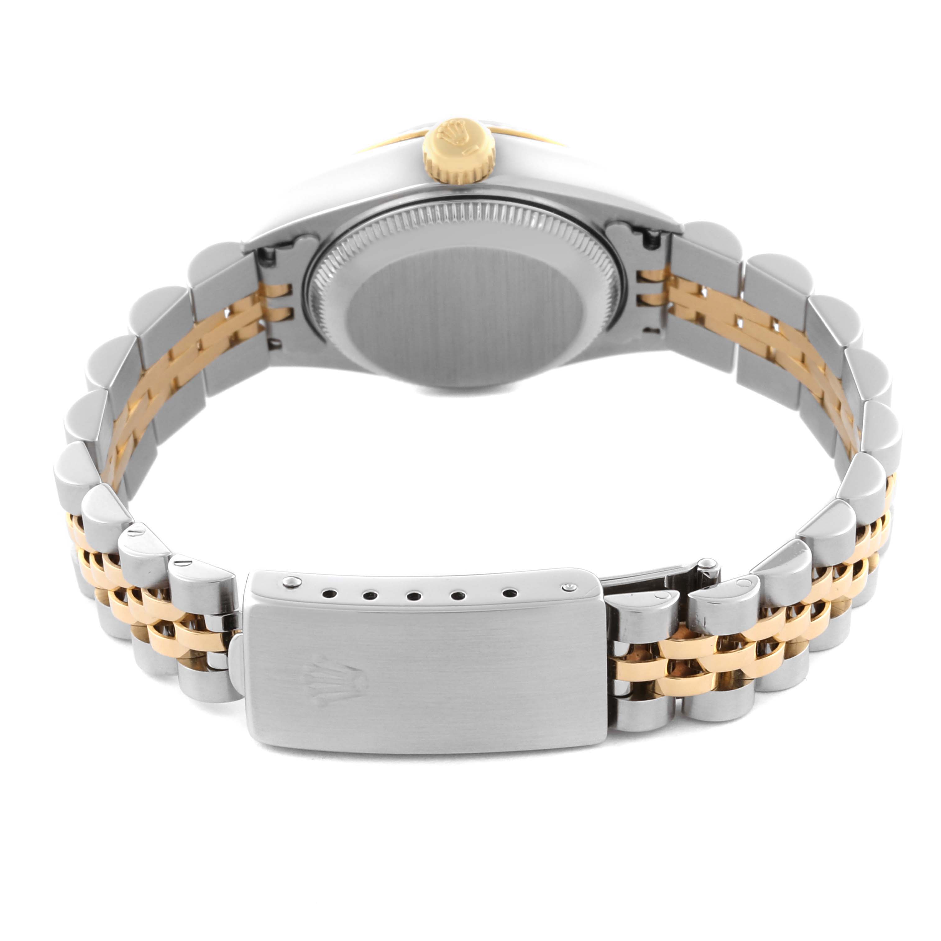 The image shows the back and clasp of a Rolex Datejust 69173 Women's Steel and Gold (two tone) Champagne Dial 69173 Women's Steel and Gold (two tone) Champagne Dial, highlighting the two-tone bracelet and gold crown.