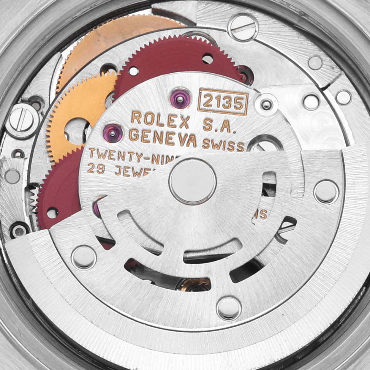 The image shows the internal mechanism of a Rolex Datejust 69173 Women's Steel and Gold (two tone) Champagne Dial 69173 Women's Steel and Gold (two tone) Champagne Dial watch, displaying gears and jewel movement components.