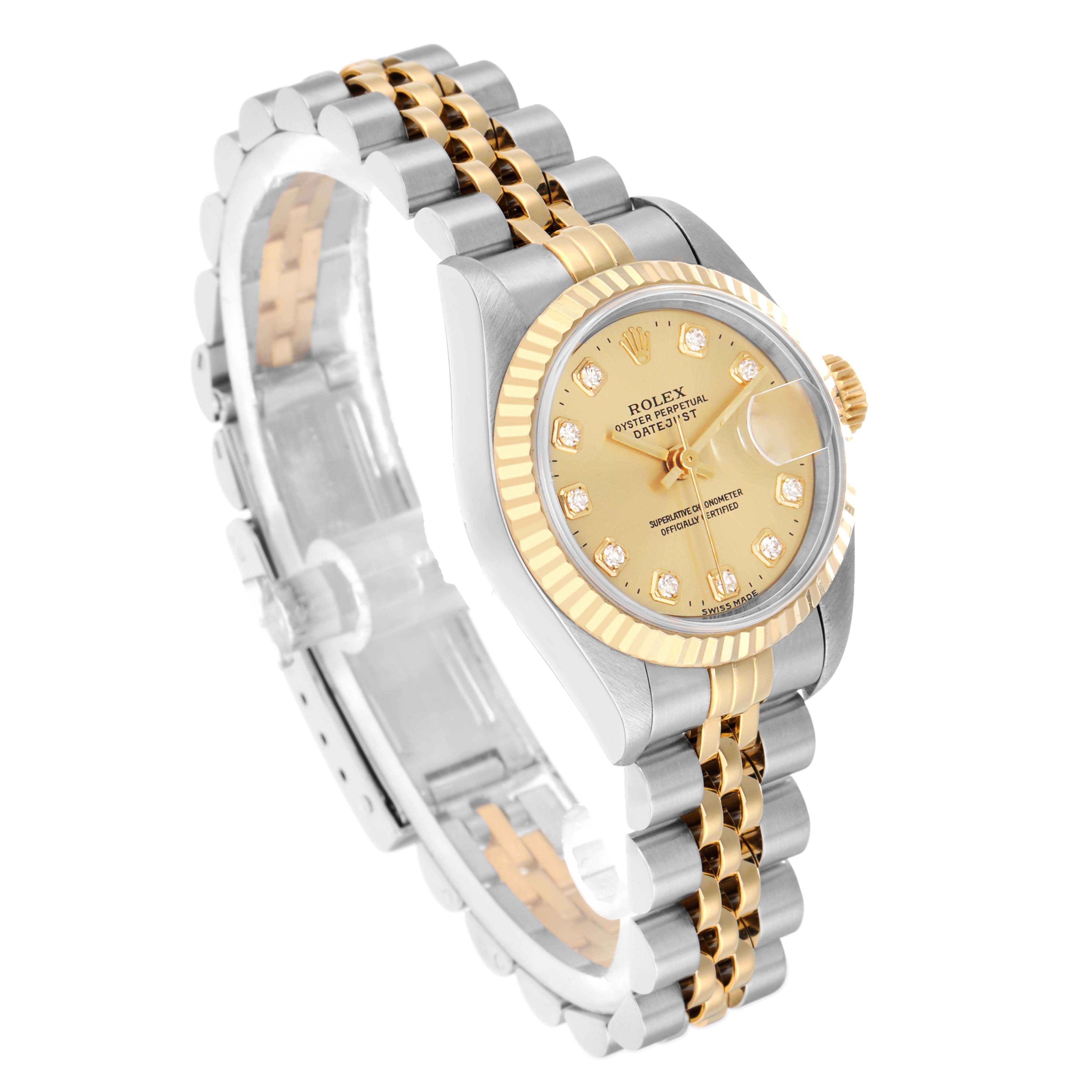 The Rolex Datejust 69173 Women
s Steel and Gold (two tone) Champagne Dial watch is shown at a three-quarter angle, highlighting the gold dial, fluted bezel, and two-tone bracelet.