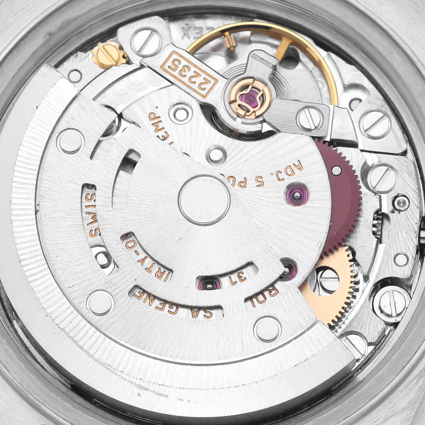 The image shows the movement mechanism of a Rolex Datejust 79173 Women's Steel and Gold (two tone) Beige Dial 79173 Women's Steel and Gold (two tone) Beige Dial watch from a top-down angle, highlighting gears and components.