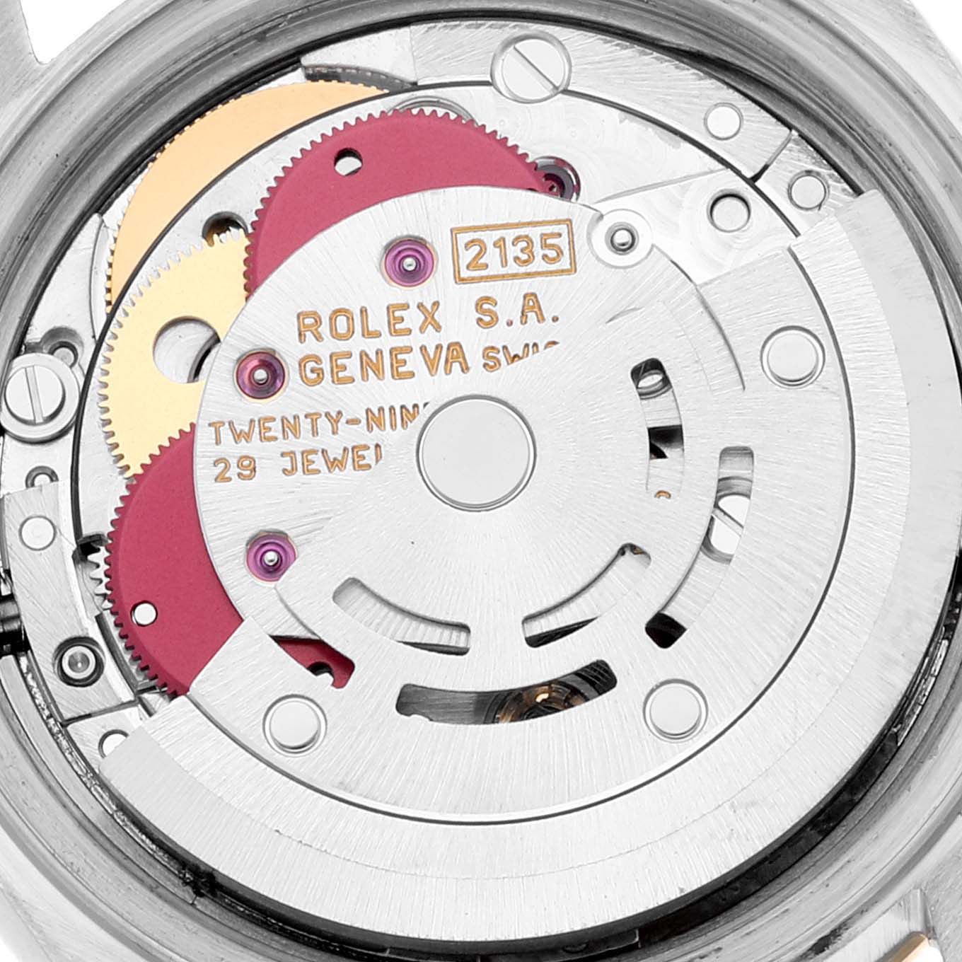 This is a close-up view of the internal movement mechanism of a Rolex Datejust 69173 Women's Steel and Gold (two tone) White Dial 69173 Women's Steel and Gold (two tone) White Dial watch.