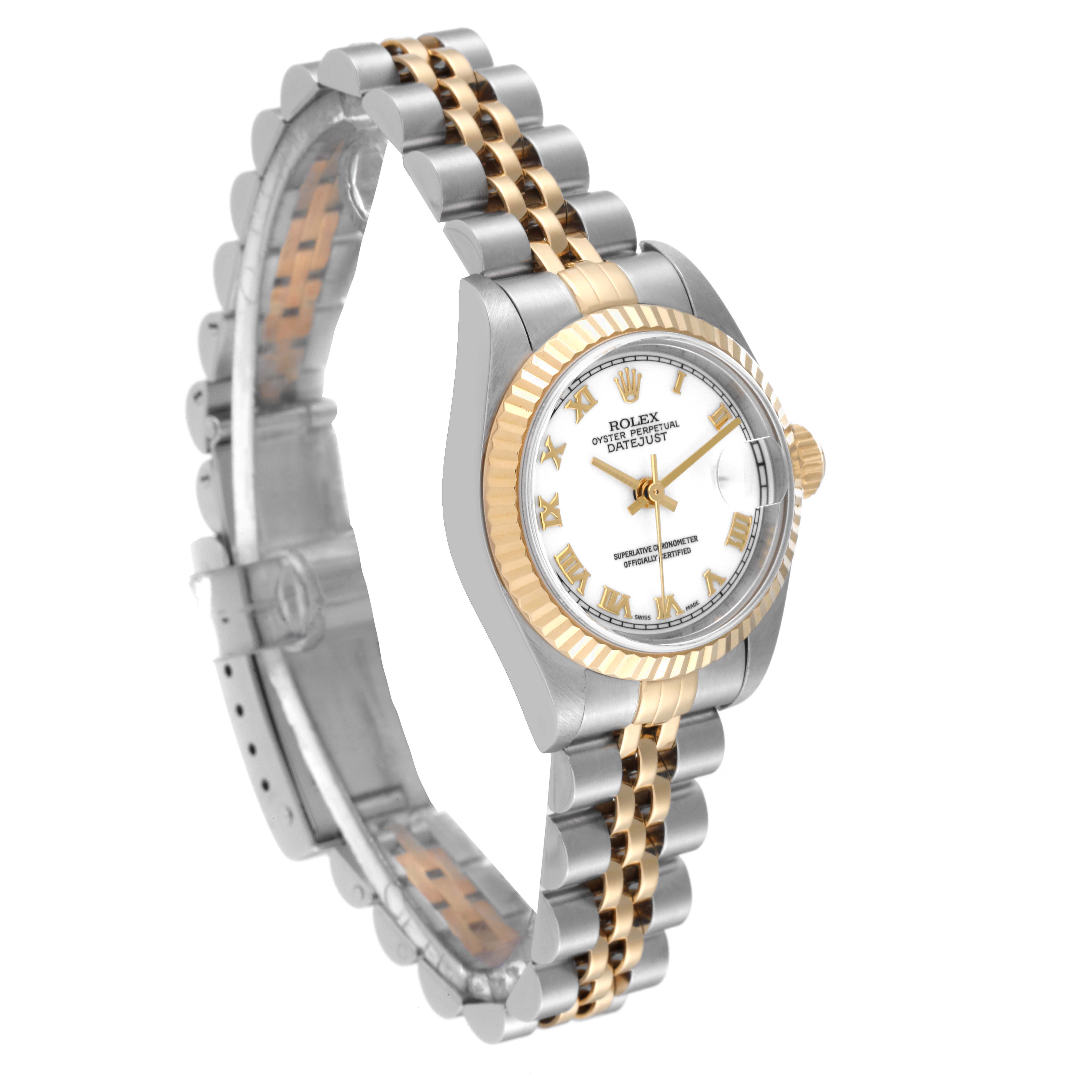 This image shows a Rolex Datejust 79173 Women's Steel and Gold (two tone) White Dial 79173 Women's Steel and Gold (two tone) White Dial watch from an oblique angle, highlighting its dial, bezel, and two-tone bracelet.