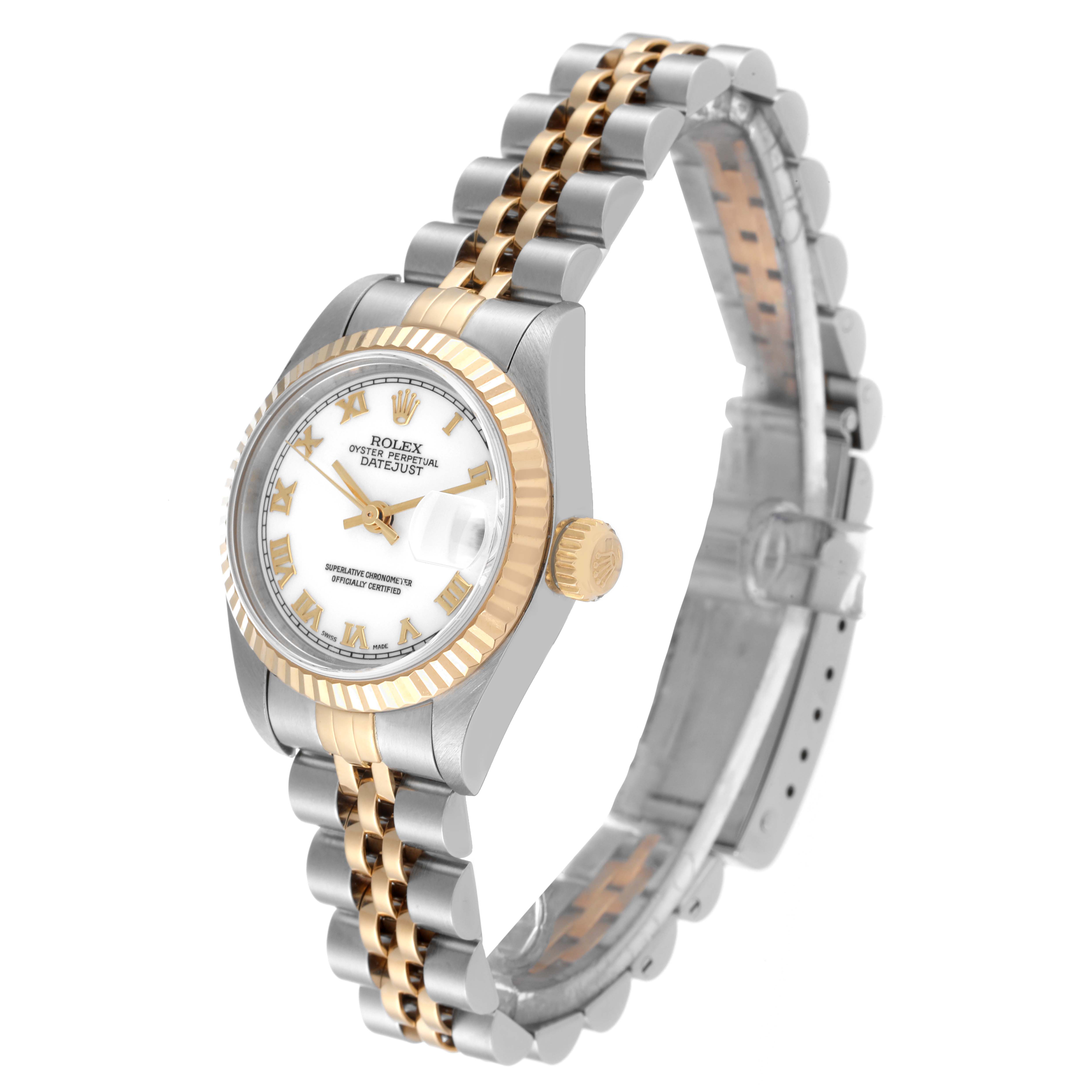 The image shows a Rolex Datejust 79173 Women's Steel and Gold (two tone) White Dial 79173 Women's Steel and Gold (two tone) White Dial watch at an angled view, highlighting its two-tone band, fluted bezel, and crown.