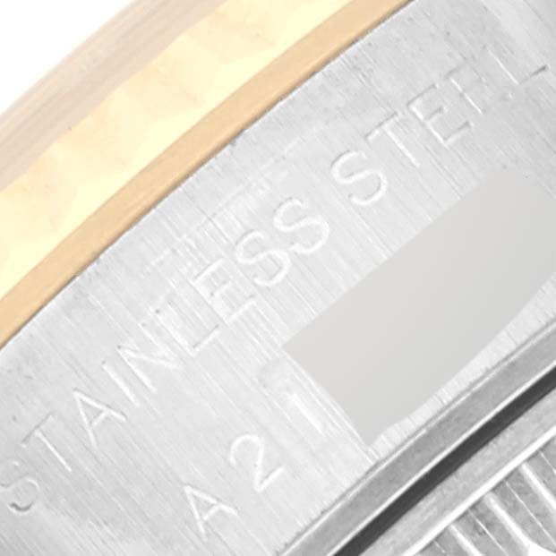 The image shows a close-up of the side of the case of a Rolex Datejust 79173 Women's Steel and Gold (two tone) White Dial 79173 Women's Steel and Gold (two tone) White Dial watch, highlighting the stainless steel material.