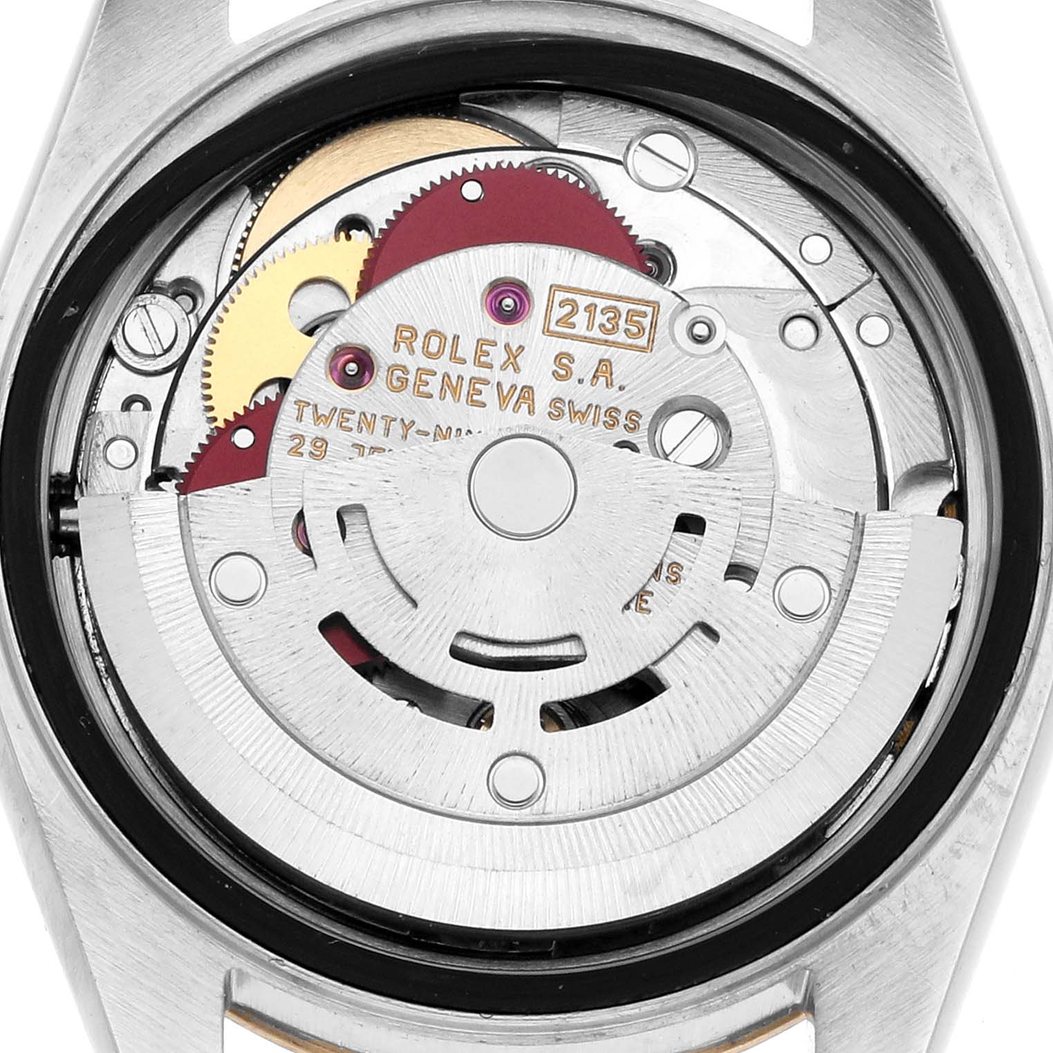 The image shows the back view of a Rolex Datejust 69173 Women
s Steel and Gold (two tone) White Dial watch, revealing its internal movement and components.