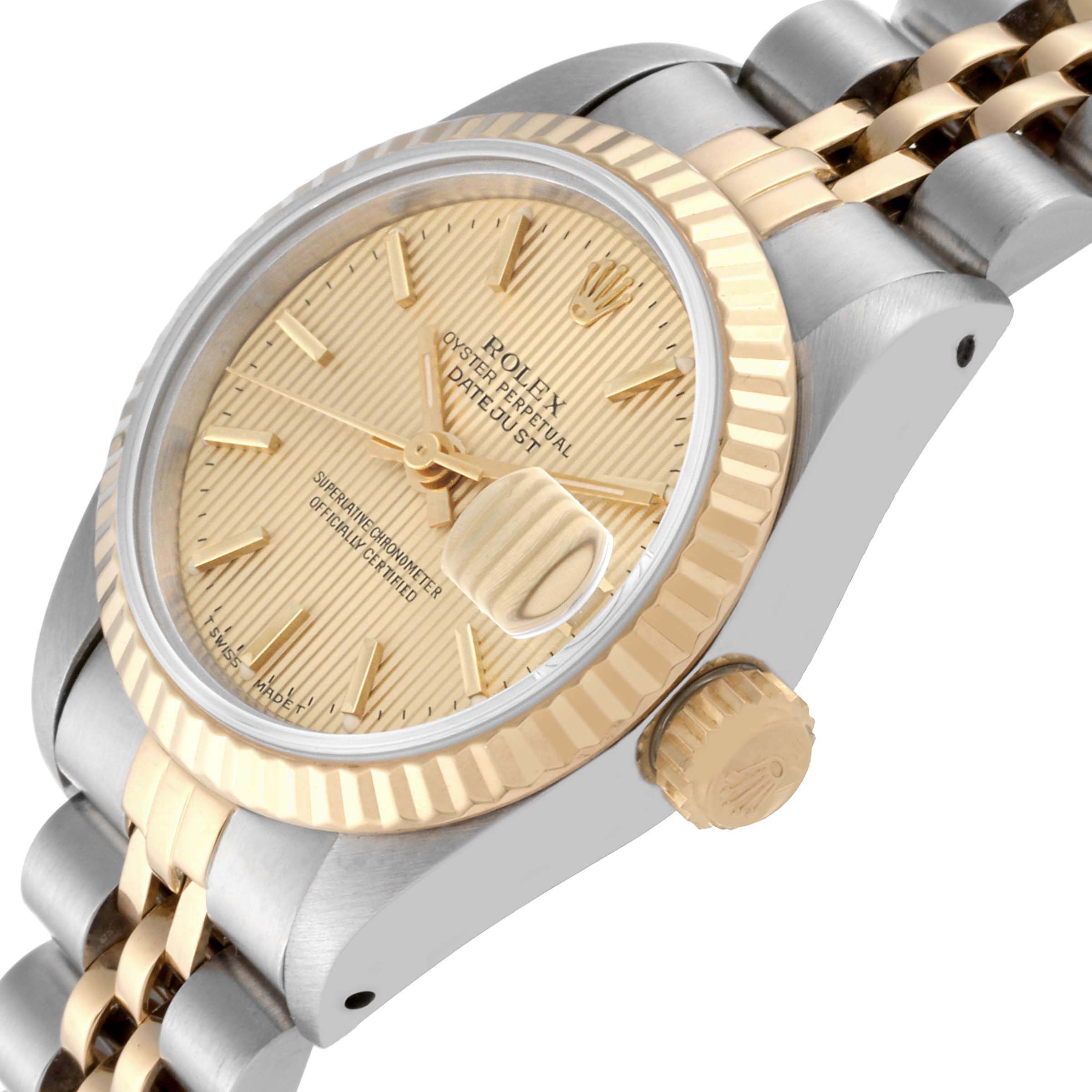 The Rolex Datejust 69173 Women's Steel and Gold (two tone) Champagne Dial 69173 Women's Steel and Gold (two tone) Champagne Dial watch is shown at a side angle, highlighting the dial, fluted bezel, crown, and part of the bracelet.