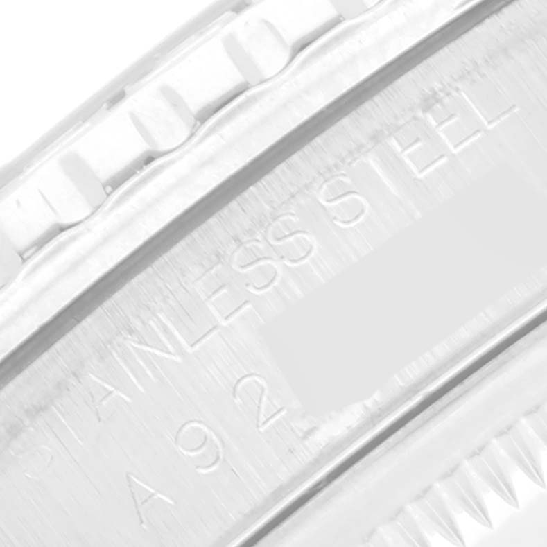 The image shows a close-up of the bezel and part of the casing of a stainless steel Rolex Turn-o-Graph 16264 Men
s Stainless Steel Blue Dial 16264 Men
s Stainless Steel Blue Dial watch.