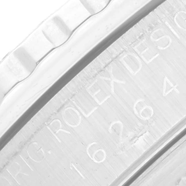 The image shows a close-up of the engraved inner bezel of a Rolex Turn-o-Graph 16264 Men
s Stainless Steel Blue Dial 16264 Men
s Stainless Steel Blue Dial watch.