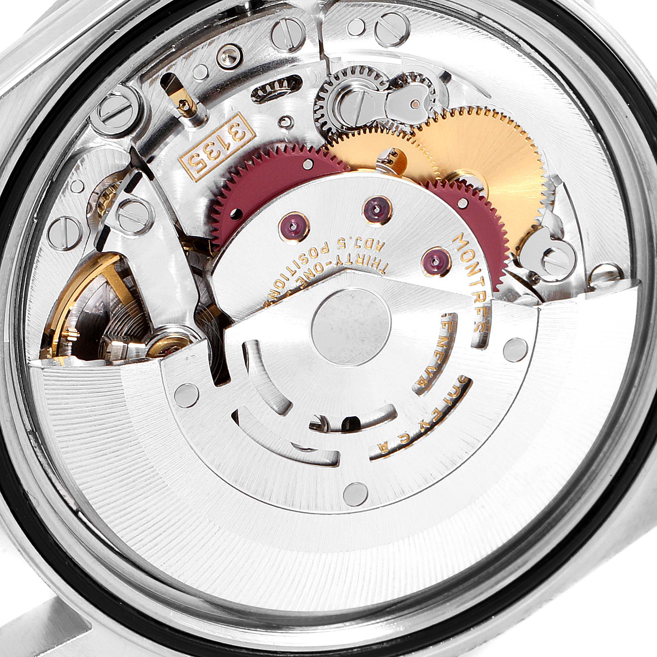 This close-up image shows the intricate internal mechanism of a Rolex Datejust 16220 Men's Stainless Steel White Dial 16220 Men's Stainless Steel White Dial watch.