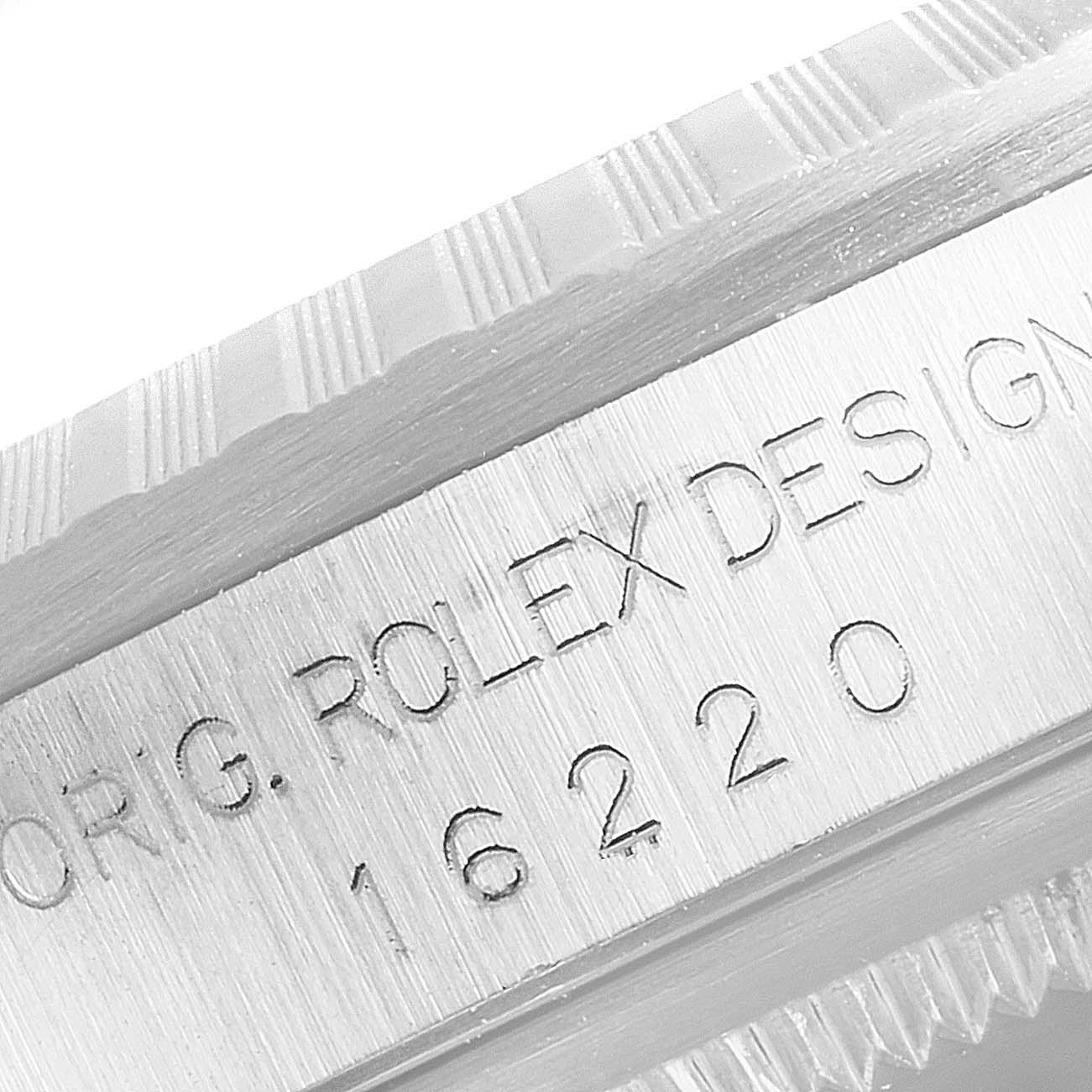 This image shows a close-up of the case side and bezel of a Rolex Datejust 16220 Men's Stainless Steel White Dial 16220 Men's Stainless Steel White Dial model, displaying the model number and "Rolex Design" engraving.