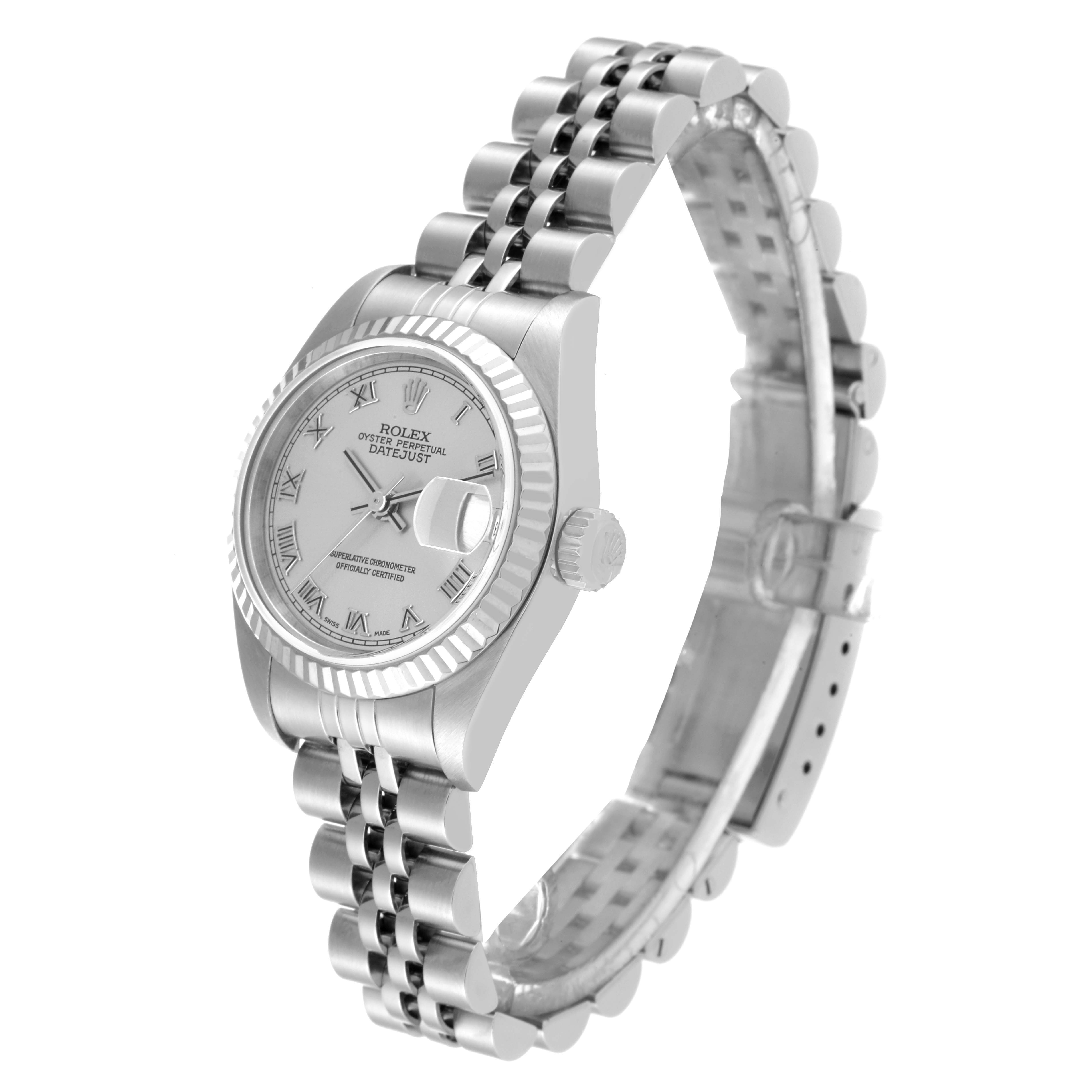 This image shows a Rolex Datejust 79174 Women's Stainless Steel Silver Dial 79174 Women's Stainless Steel Silver Dial watch from a three-quarter angle, displaying the face, fluted bezel, crown, and jubilee bracelet.