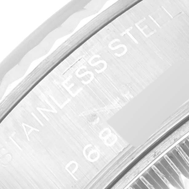 This is a close-up angle showing "STAINLESS STEEL" engraving on the caseback of a Rolex Datejust 79174 Women's Stainless Steel Silver Dial 79174 Women's Stainless Steel Silver Dial watch.