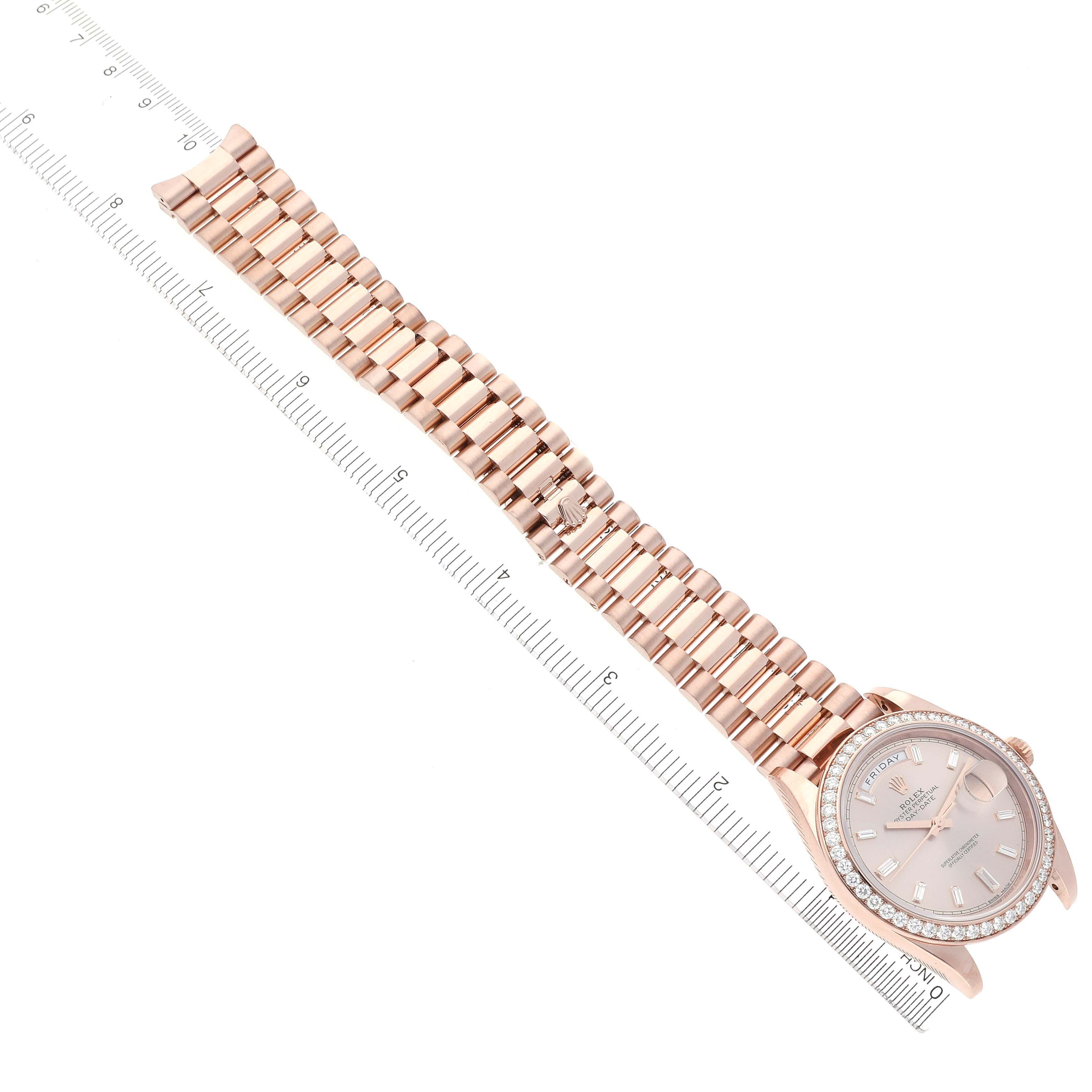 The image shows a Rolex President 228345 Men's Rose Gold Pink Dial 228345 Men's Rose Gold Pink Dial model watch from a top angle, displaying the full bracelet and face with a ruler for scale.
