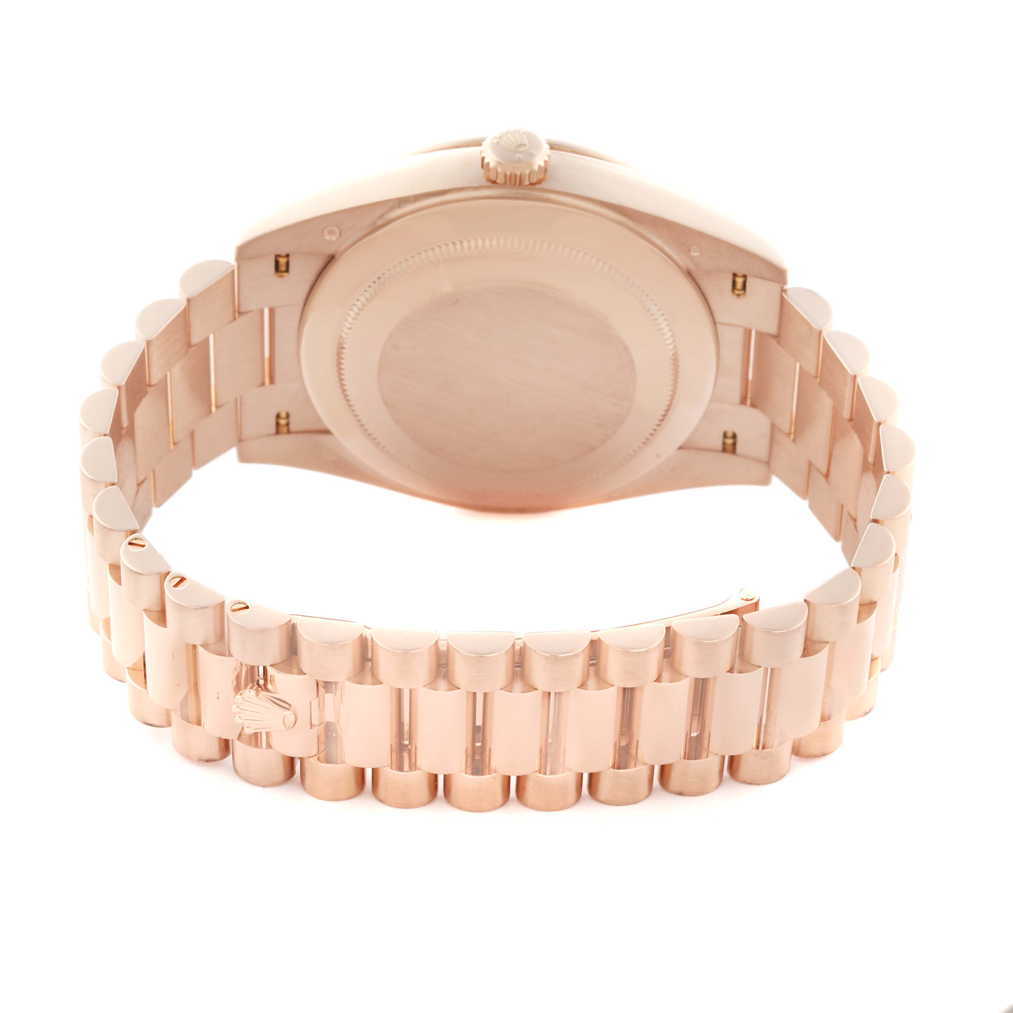 The Rolex President 228345 Men's Rose Gold Pink Dial 228345 Men's Rose Gold Pink Dial model is shown from the back, highlighting the bracelet and case back.