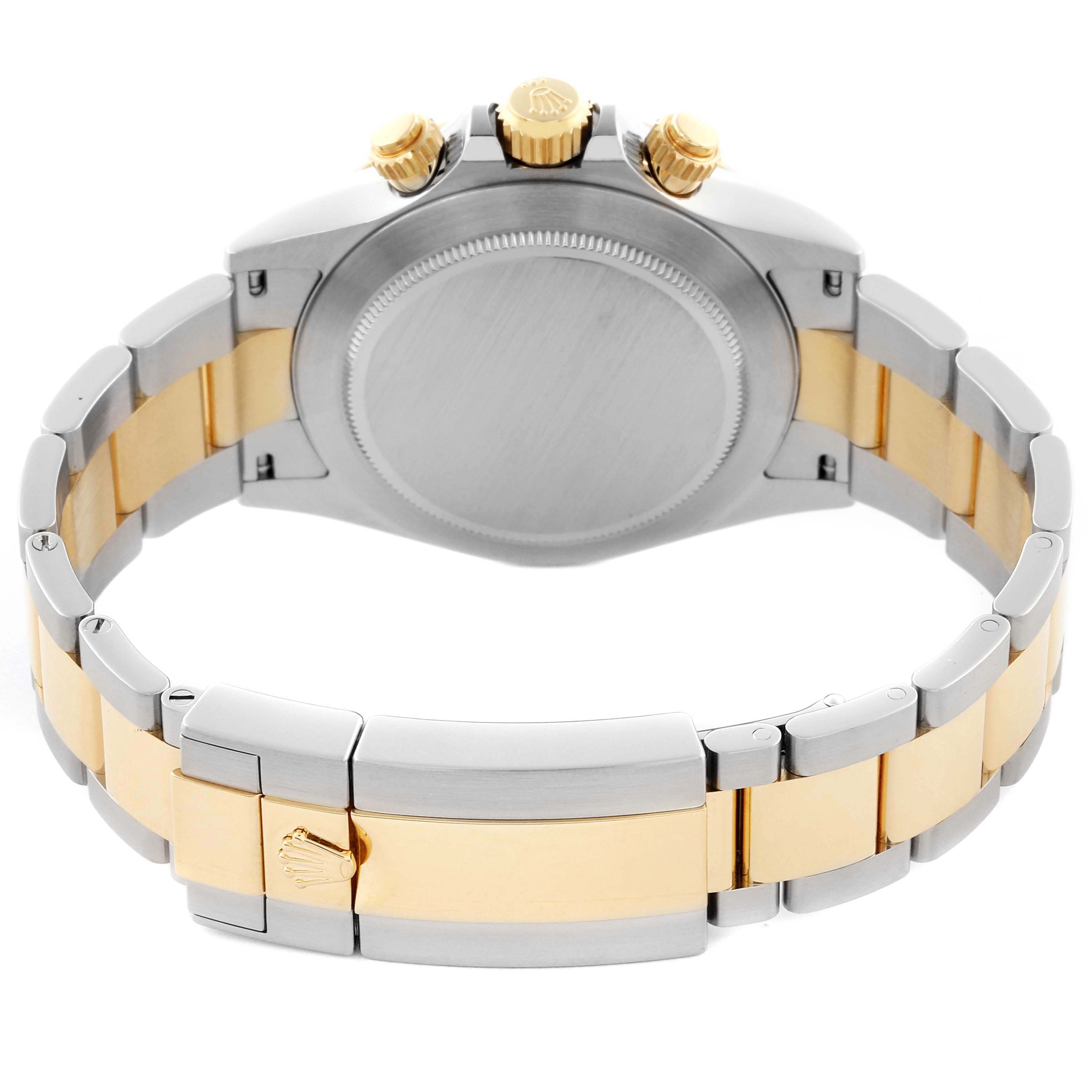 The Rolex Daytona 116523 Men
s Steel and Gold (two tone) Silver Dial 116523 Men
s Steel and Gold (two tone) Silver Dial watch is shown from the back, highlighting the case back, bracelet, and clasp.