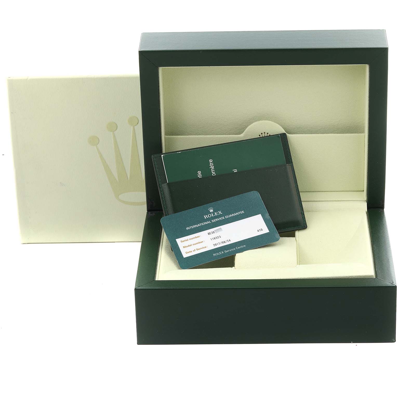 The image shows a Rolex Daytona 116523 Men
s Steel and Gold (two tone) Silver Dial 116523 Men
s Steel and Gold (two tone) Silver Dial watch box with warranty cards and booklets inside, viewed from the front.