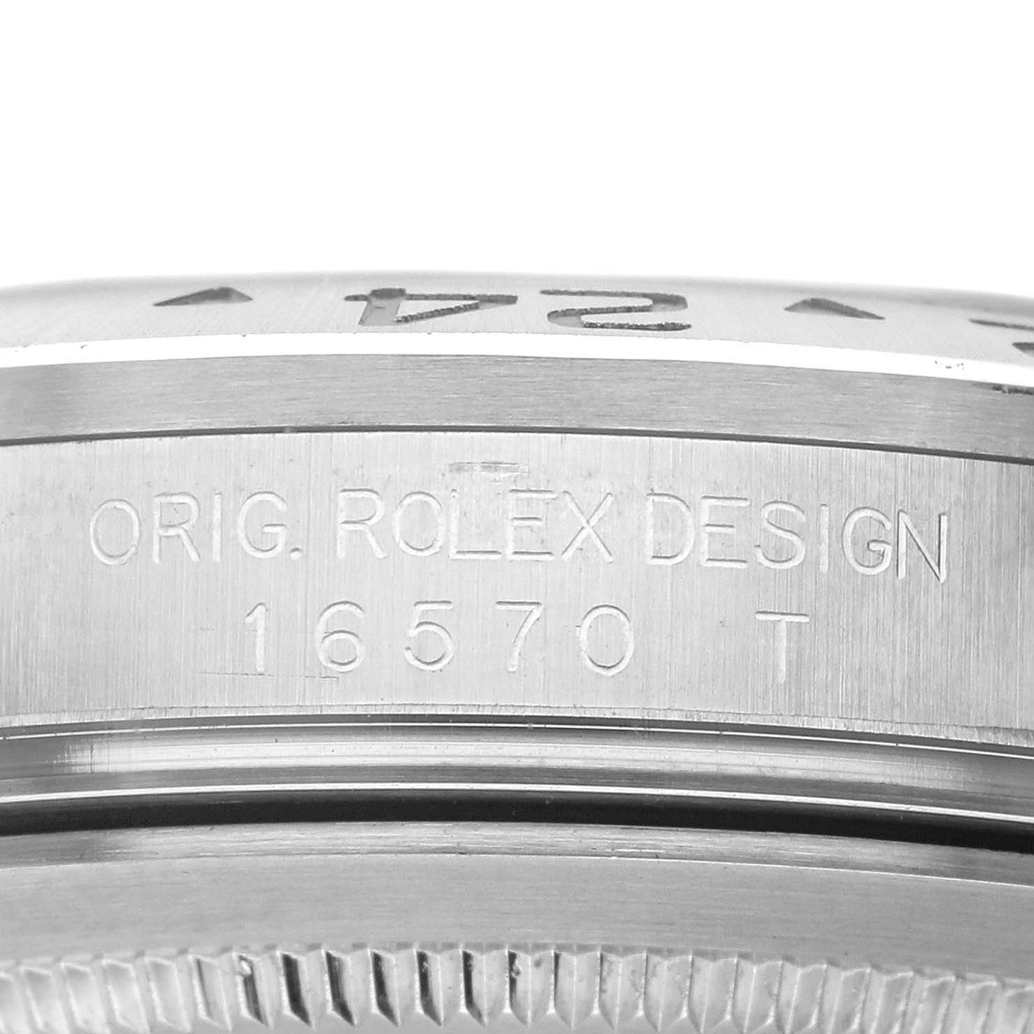 The image shows a side view of the Rolex Explorer 16570 Men's Stainless Steel White Dial 16570 Men's Stainless Steel White Dial's bezel, highlighting the engraved reference number and design details.