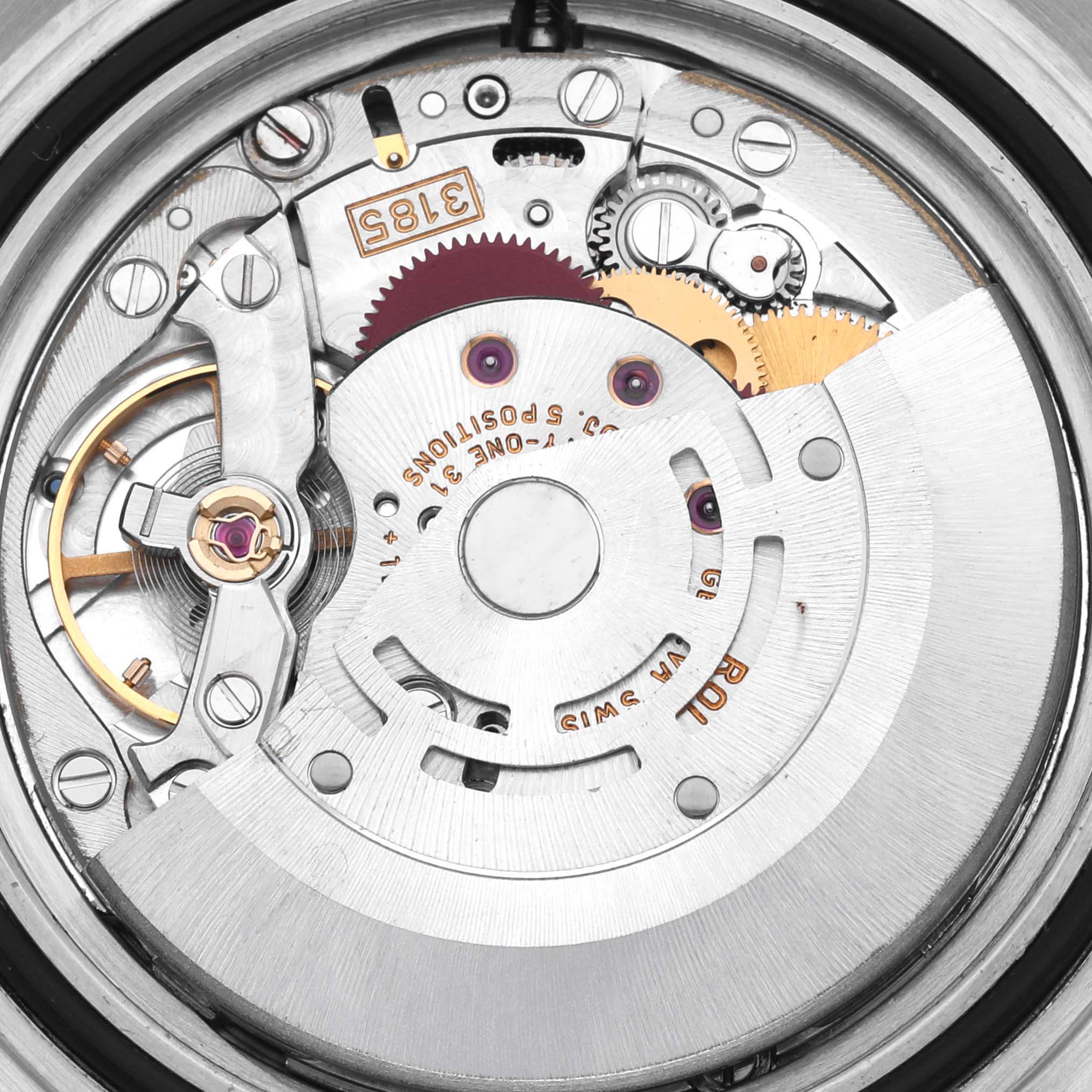 This image shows the internal mechanism of a Rolex GMT-Master 16710 Men
s Stainless Steel Black Dial 16710 Men
s Stainless Steel Black Dial watch, including gears and the rotor at a close-up angle.