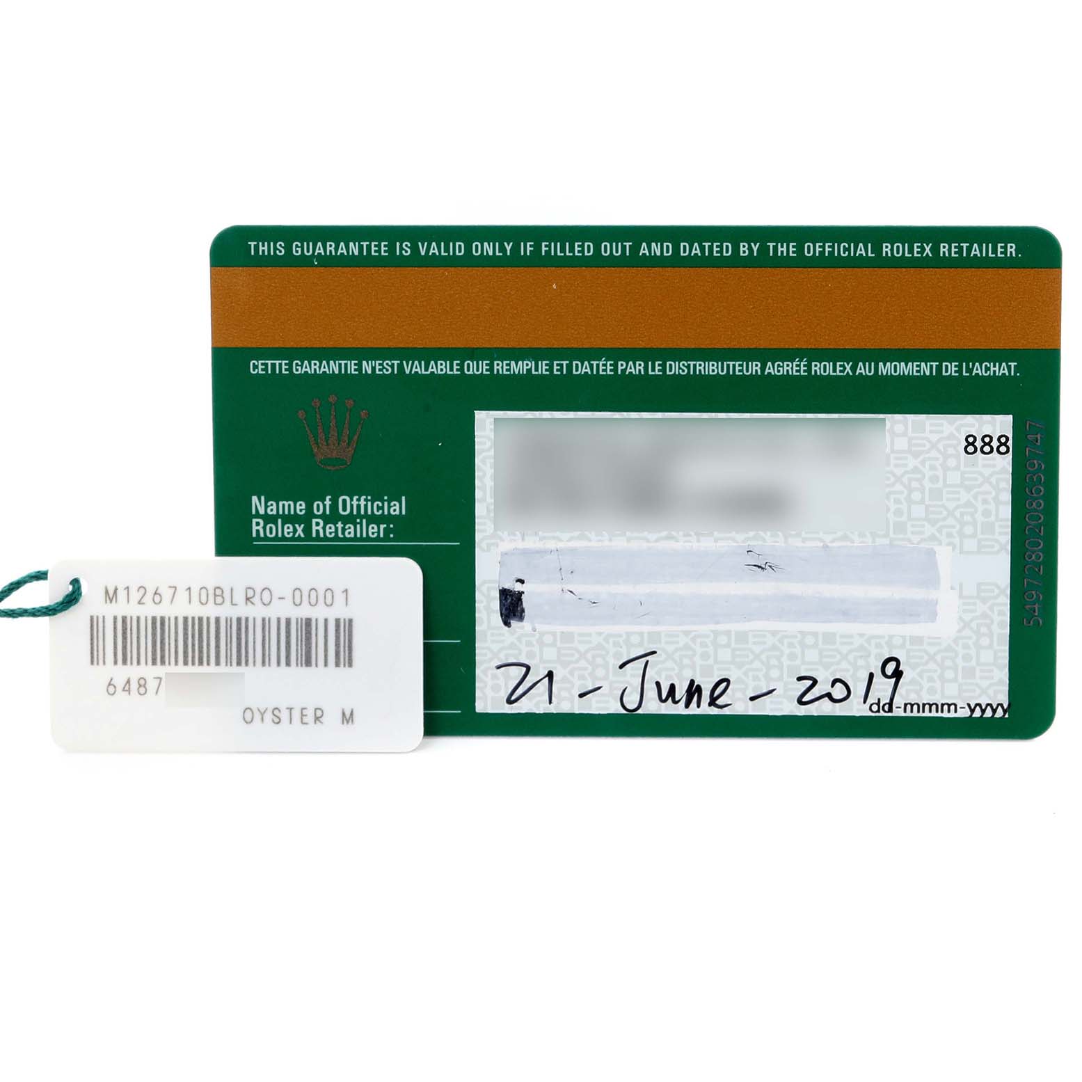 The image shows a Rolex GMT-Master 126710 Men's Stainless Steel Black Dial 126710 Men's Stainless Steel Black Dial warranty card and a tag with a model number.