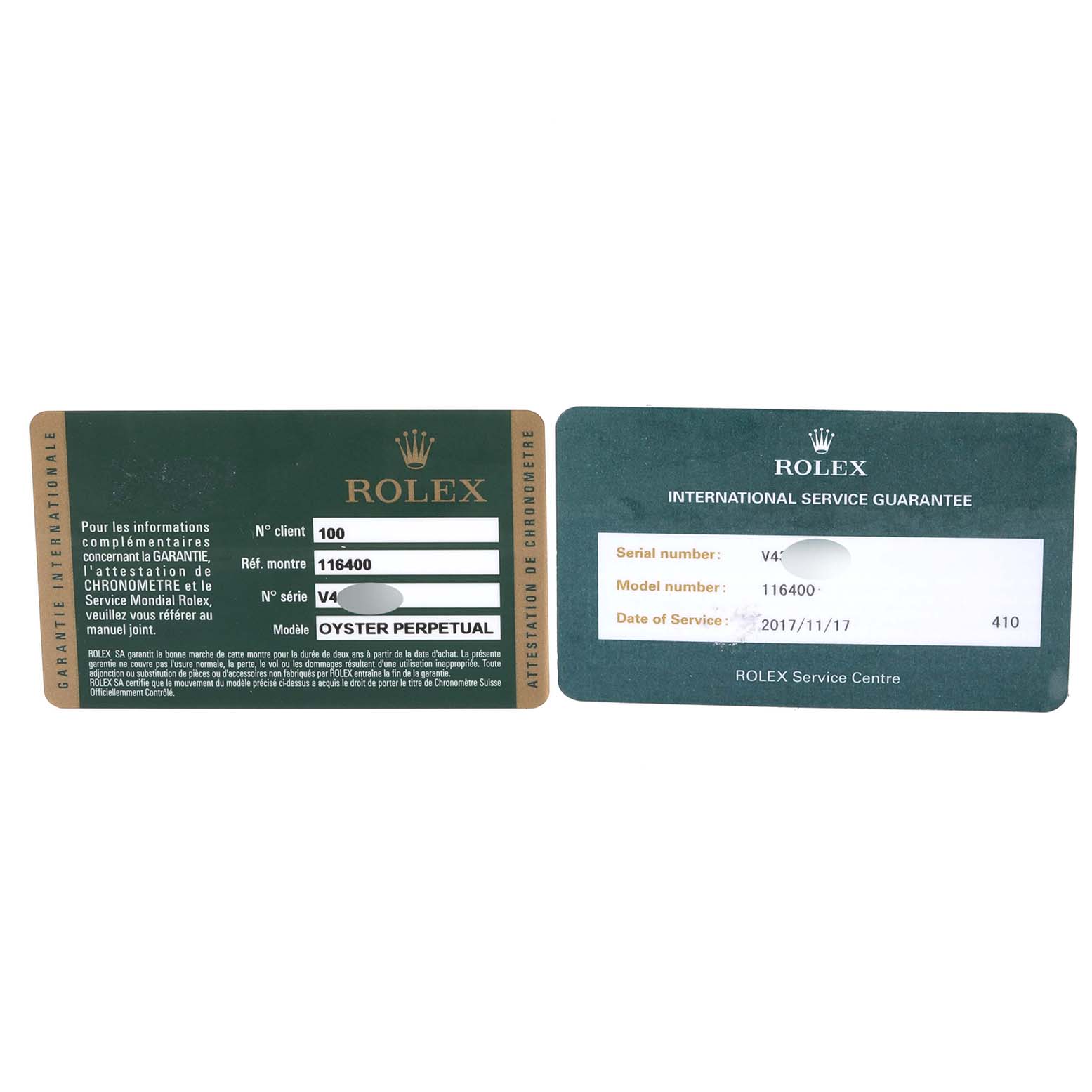 The image shows two Rolex Milgauss 116400 Men
s Stainless Steel Black Dial 116400 Men
s Stainless Steel Black Dial warranty and service cards, displaying model and serial numbers.