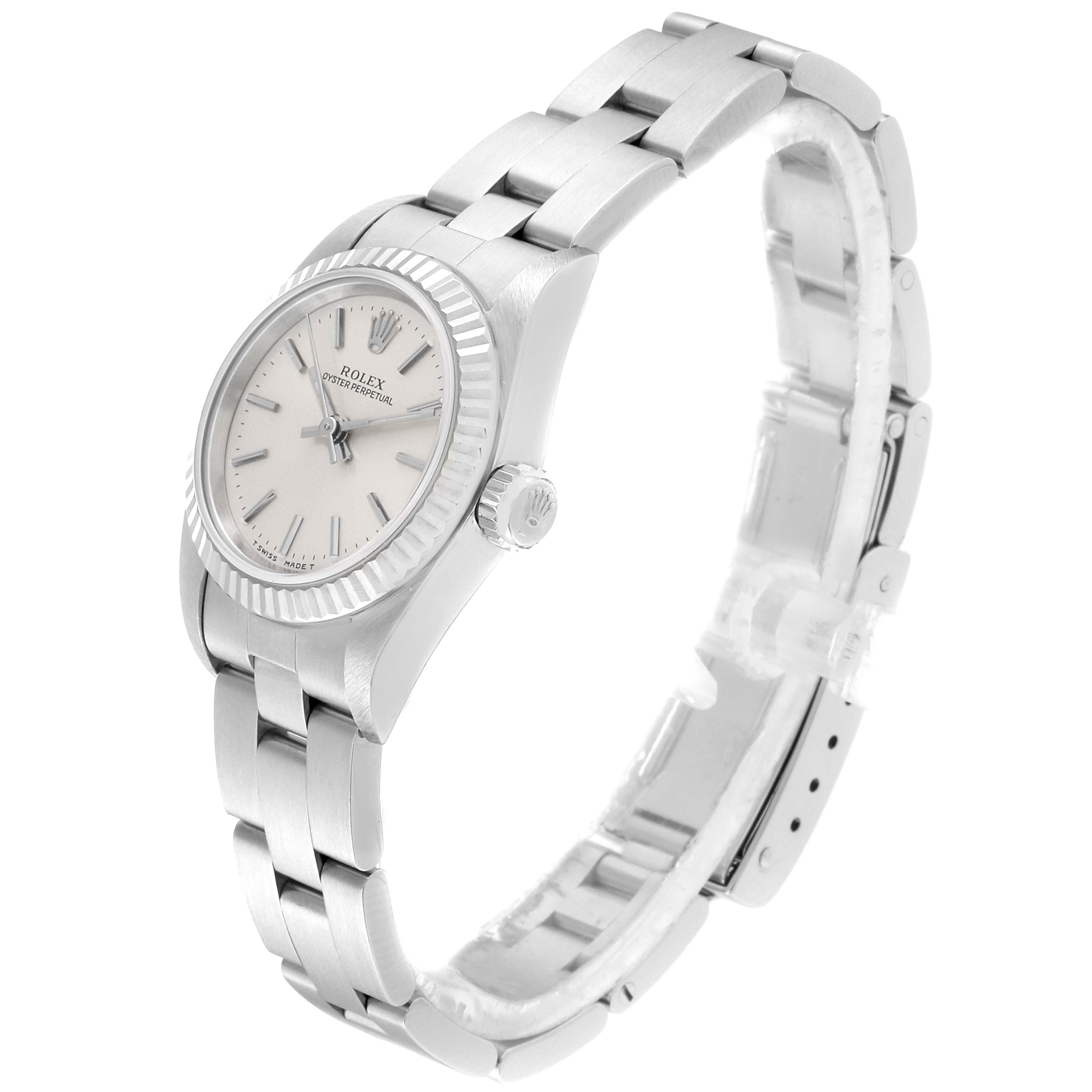 The image shows a side-angle view of a Rolex Oyster Perpetual 67194 Women's Stainless Steel Silver Dial 67194 Women's Stainless Steel Silver Dial watch, highlighting its bracelet, case, crown, and dial.