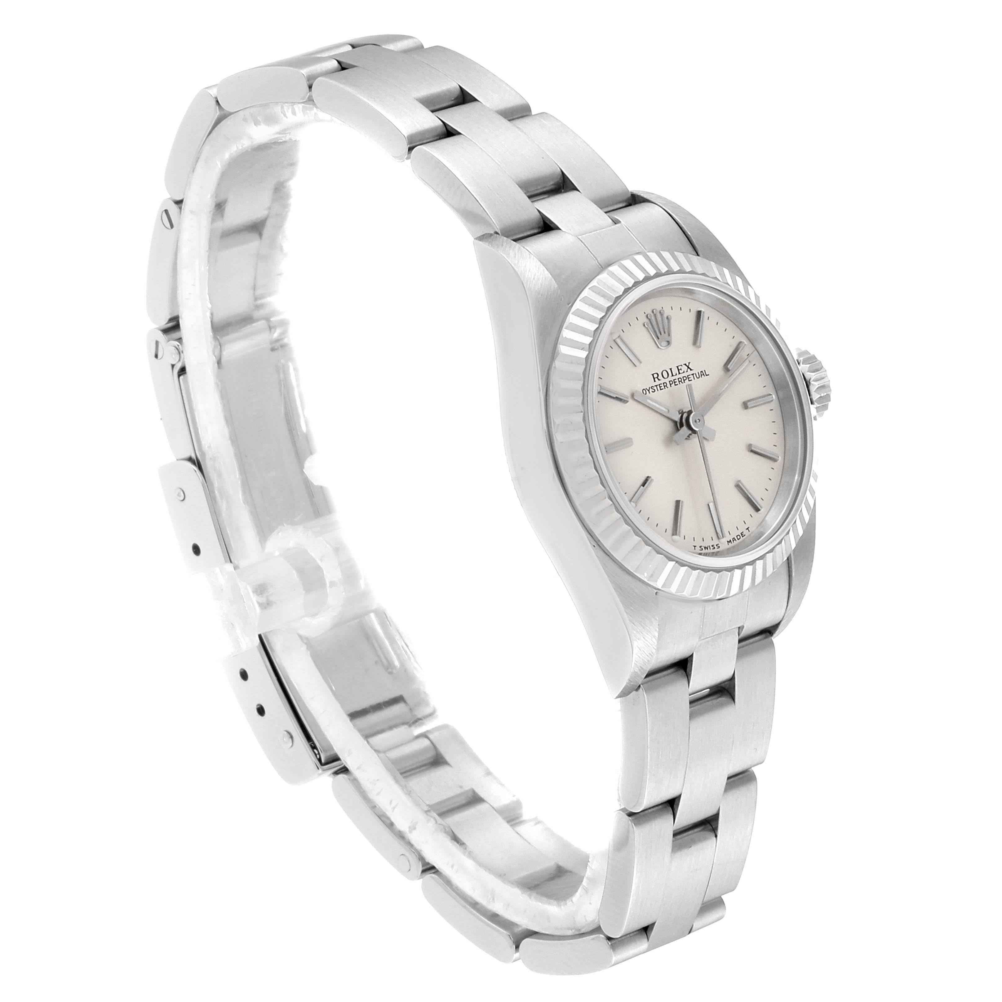 This image shows a Rolex Oyster Perpetual 67194 Women's Stainless Steel Silver Dial 67194 Women's Stainless Steel Silver Dial watch angled to display the watch face, bezel, and part of the bracelet.