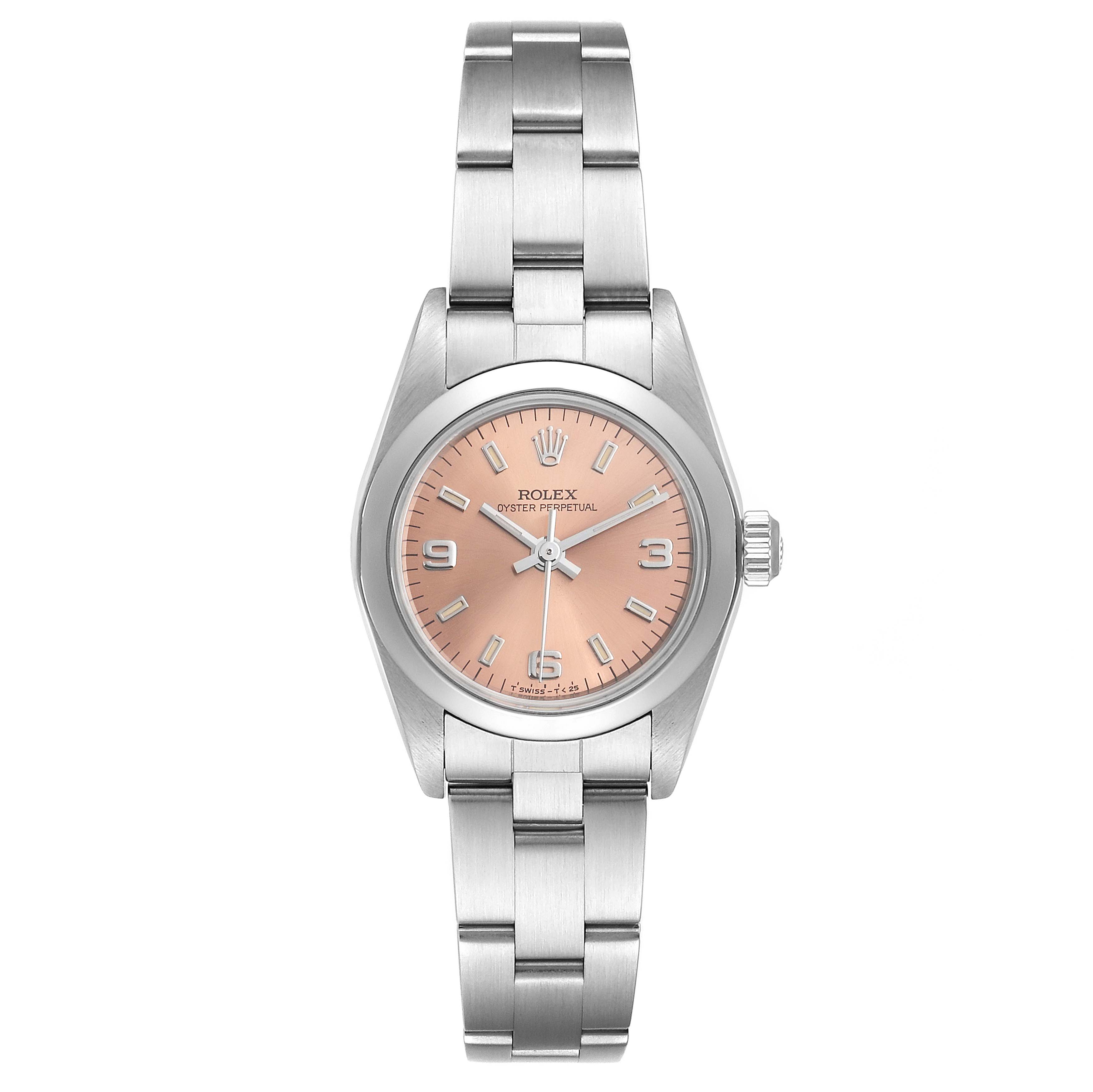 This image shows a front view of a Rolex Oyster Perpetual 76080 Women's Stainless Steel Pink Dial 76080 Women's Stainless Steel Pink Dial watch with a metallic band and a salmon-colored dial.