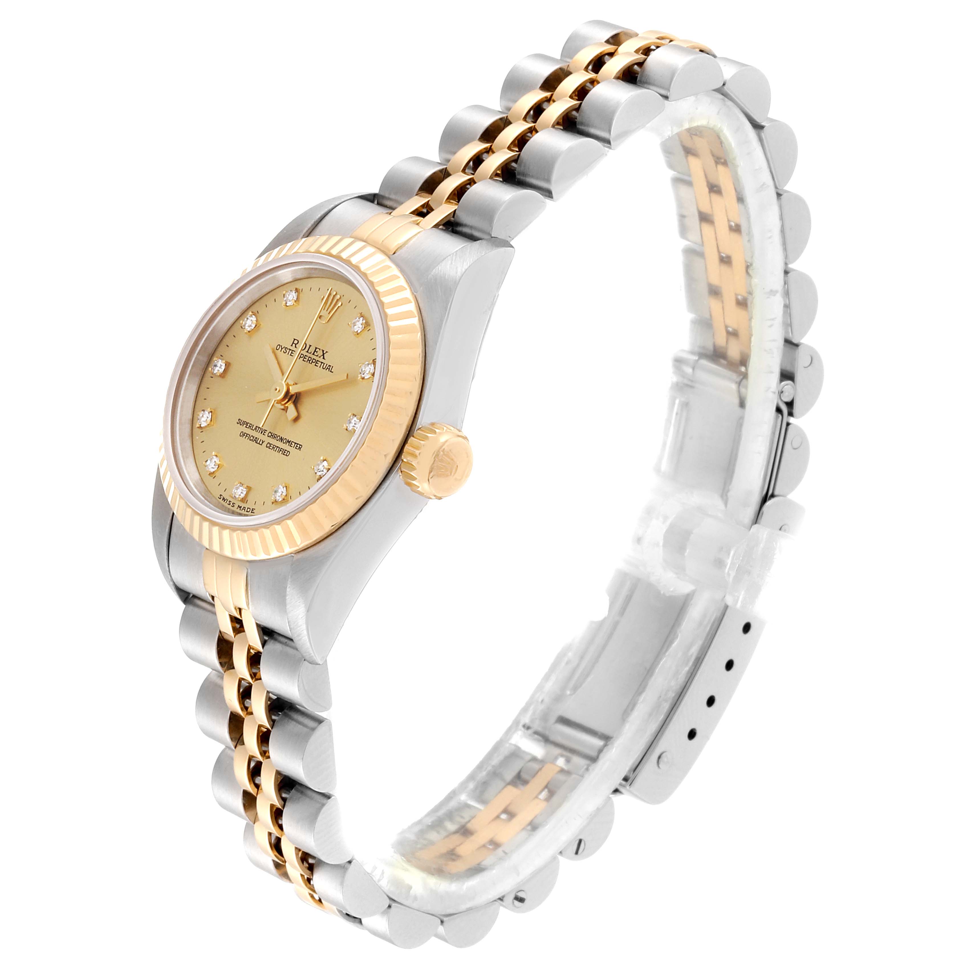 The Rolex Oyster Perpetual 67193 Women
s Steel and Gold (two tone) Champagne Dial 67193 Women
s Steel and Gold (two tone) Champagne Dial watch is shown at a slight angle revealing its dial, bezel, crown, and bracelet.