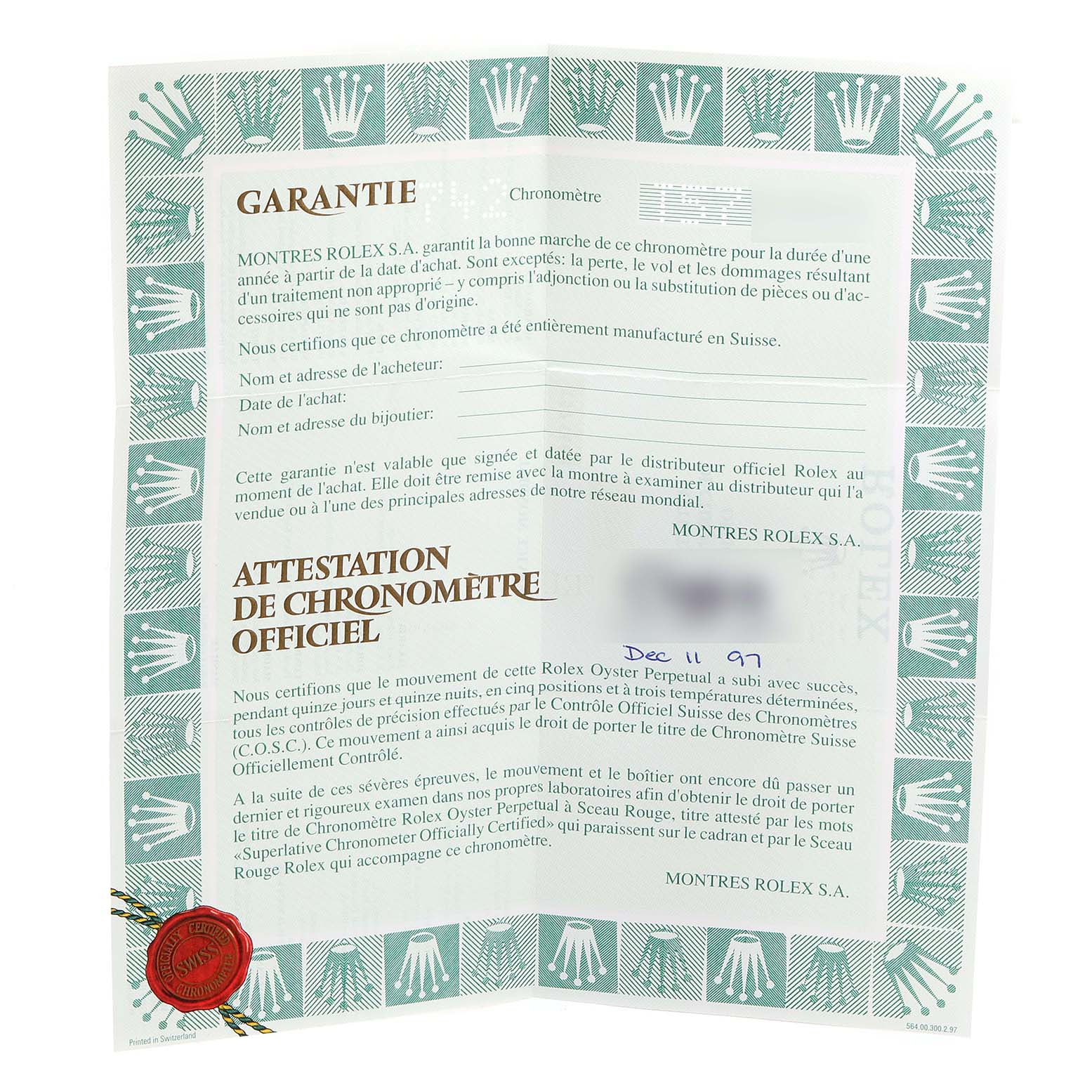 This image shows the warranty and chronometer certificate for a Rolex Oyster Perpetual 67193 Women
s Steel and Gold (two tone) Champagne Dial 67193 Women
s Steel and Gold (two tone) Champagne Dial watch.