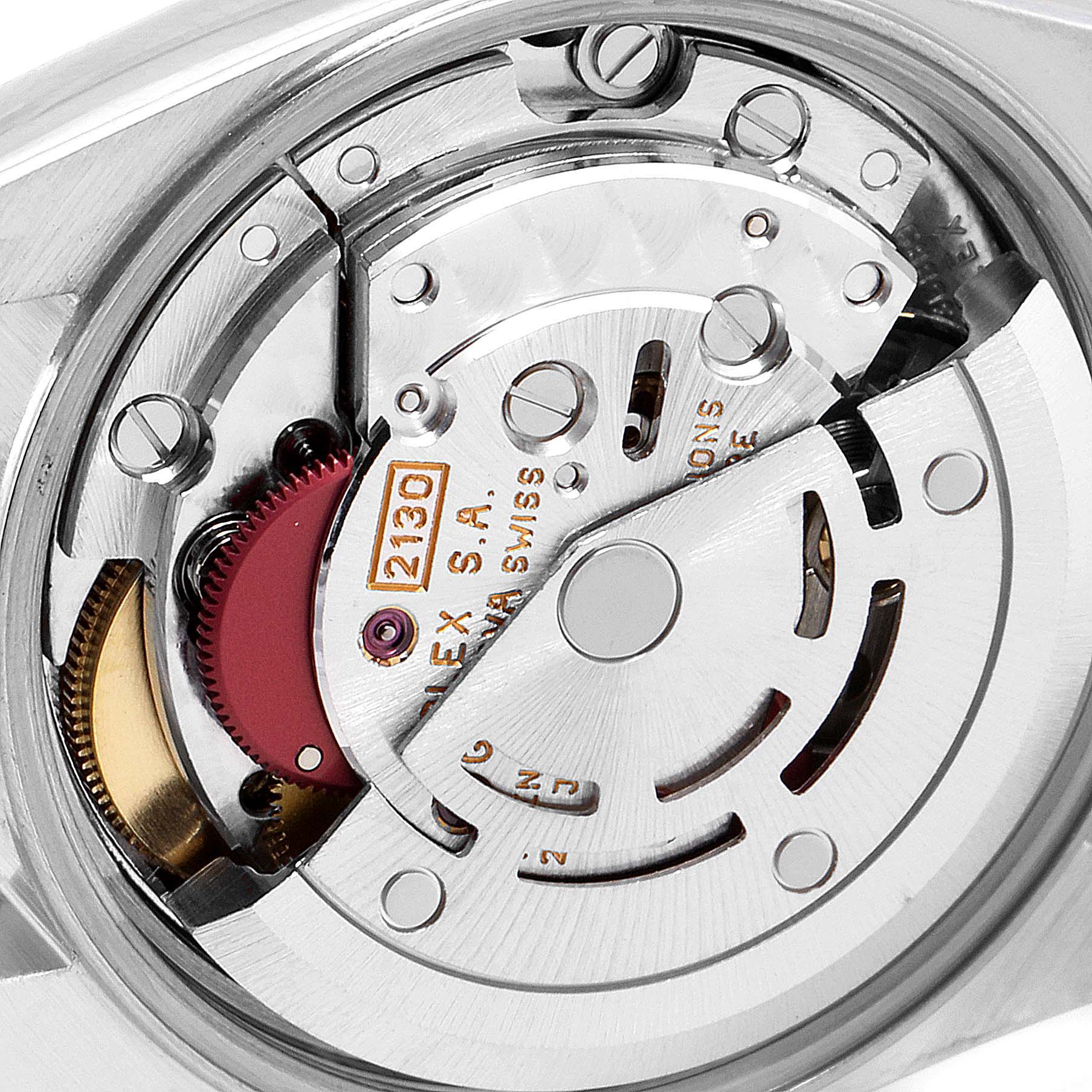 This image shows a close-up of the movement mechanism inside a Rolex Oyster Perpetual 67193 Women
s Steel and Gold (two tone) Champagne Dial 67193 Women
s Steel and Gold (two tone) Champagne Dial watch.