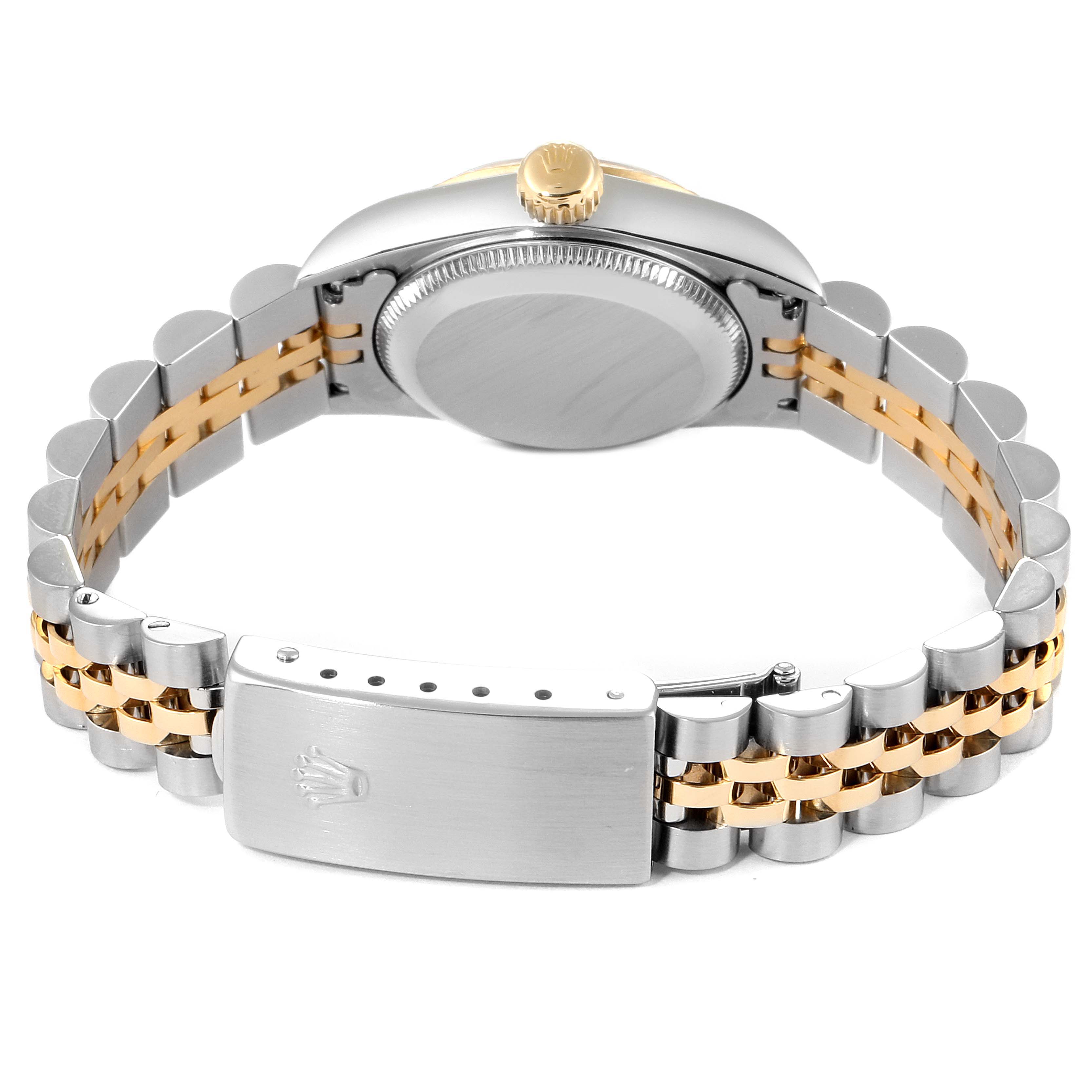 This image shows the back, crown, and bracelet of a Rolex Oyster Perpetual 67193 Women
s Steel and Gold (two tone) Champagne Dial 67193 Women
s Steel and Gold (two tone) Champagne Dial watch.