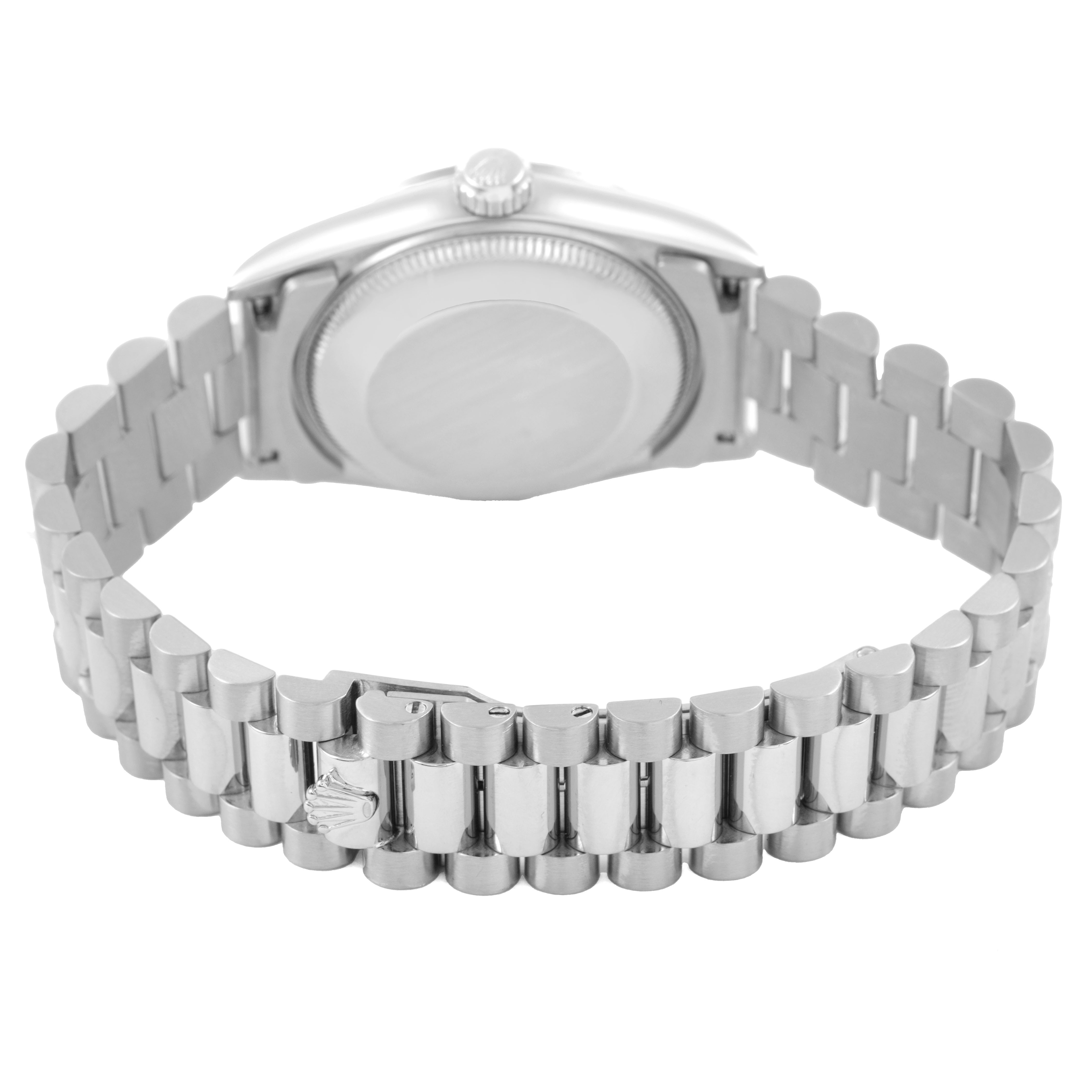 The image shows the back view of a Rolex President 68279 Women's White Gold Silver Dial model, focusing on the clasp, bracelet, and case back.