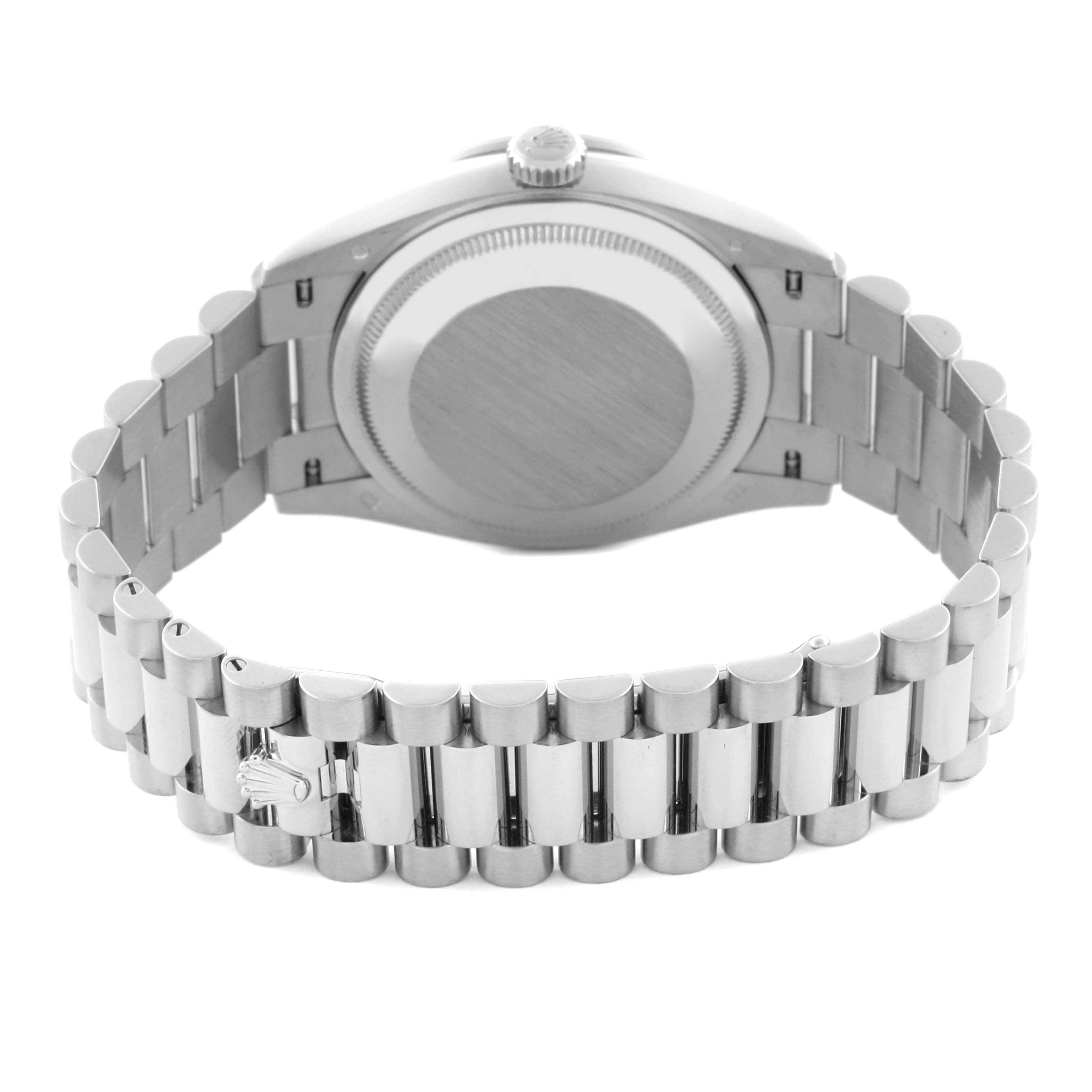 The image shows the back and bracelet of the Rolex President 128349 Men
s White Gold Blue Dial 128349 Men
s White Gold Blue Dial model, focusing on its clasp and links.