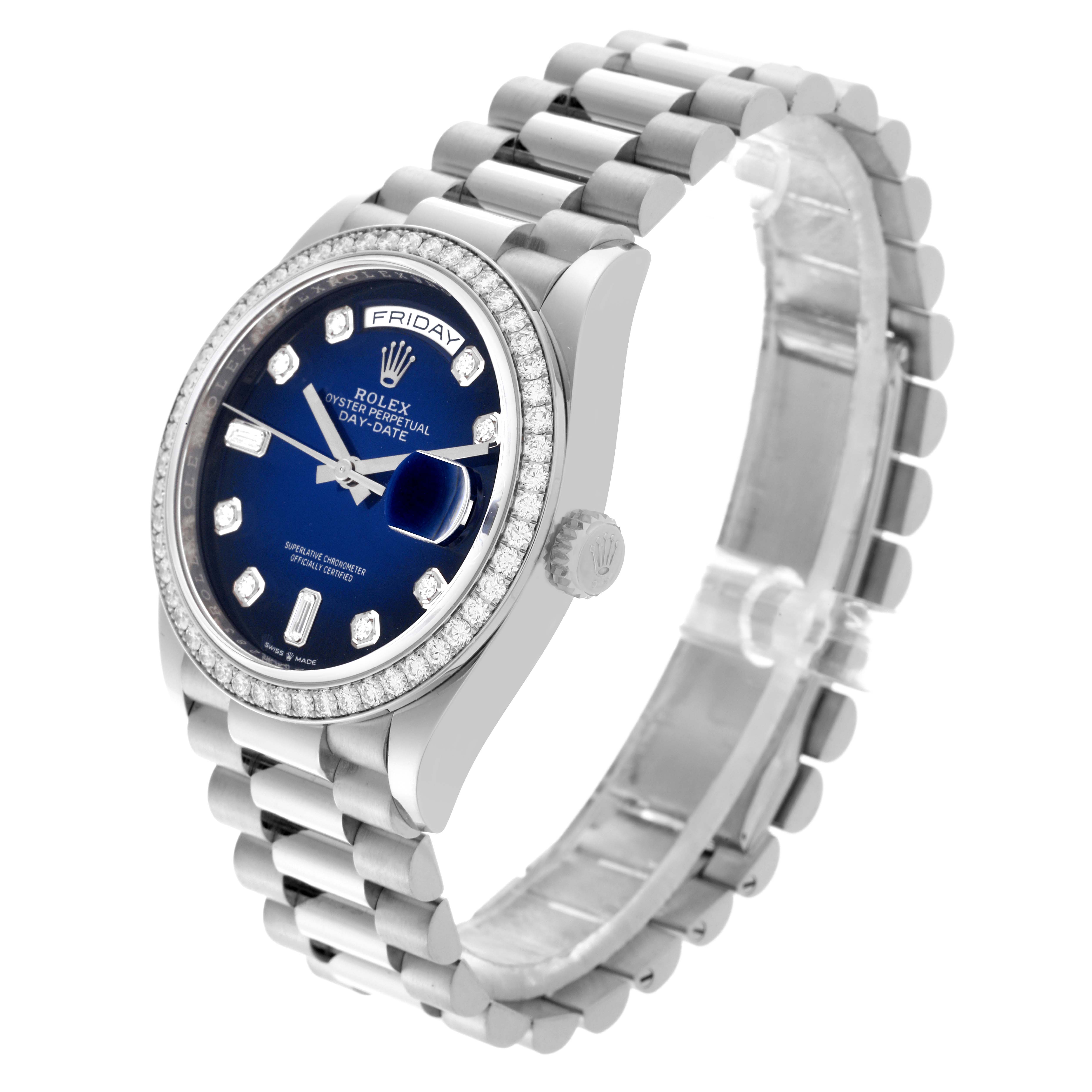 The Rolex President 128349 Men
s White Gold Blue Dial 128349 Men
s White Gold Blue Dial watch is shown at an angled side view, highlighting the face, bezel, and bracelet.