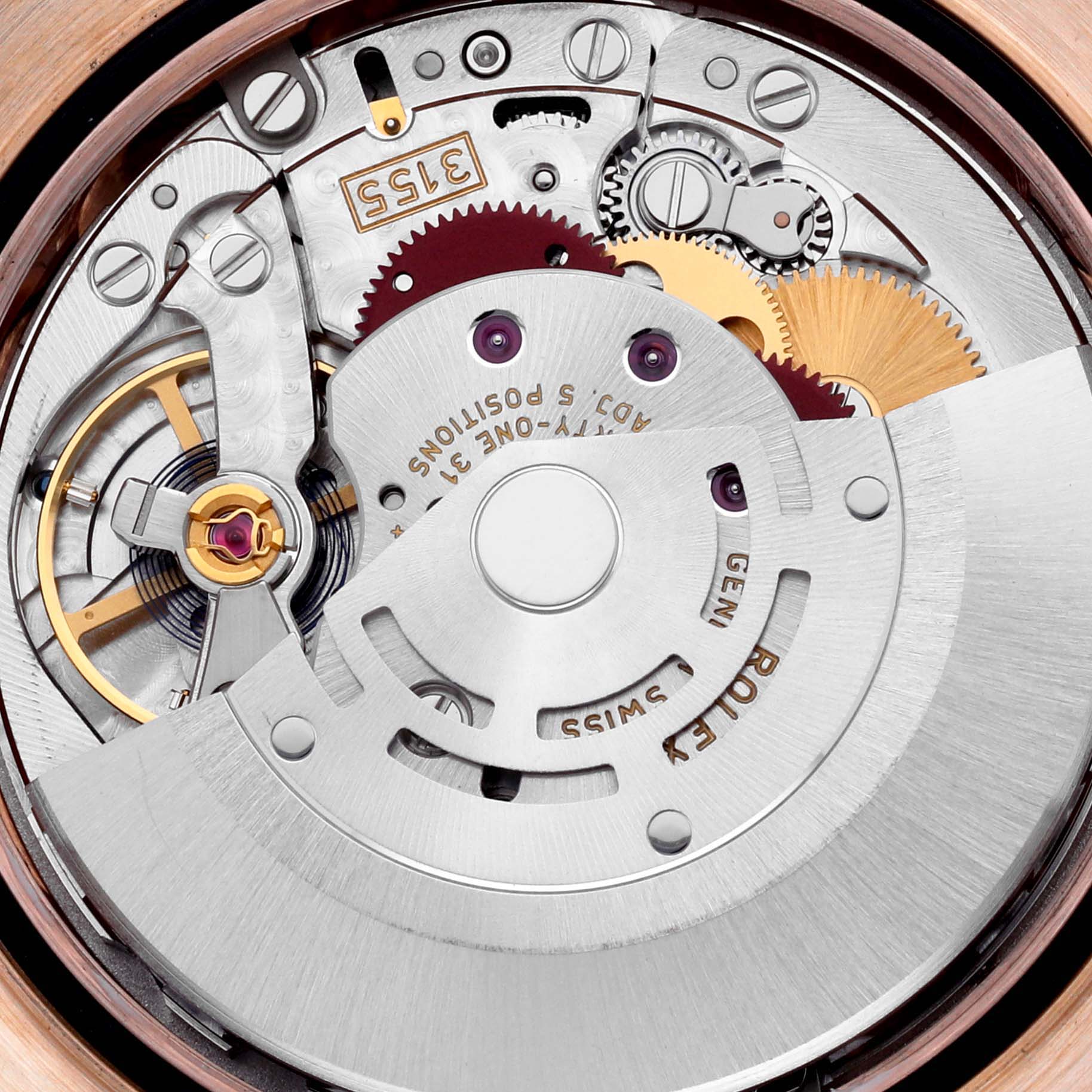 The image shows a close-up of the Rolex President 118135 Men
s Rose Gold Brown Dial 118135 Men
s Rose Gold Brown Dial model
s movement, highlighting gears and mechanical components inside the watch.