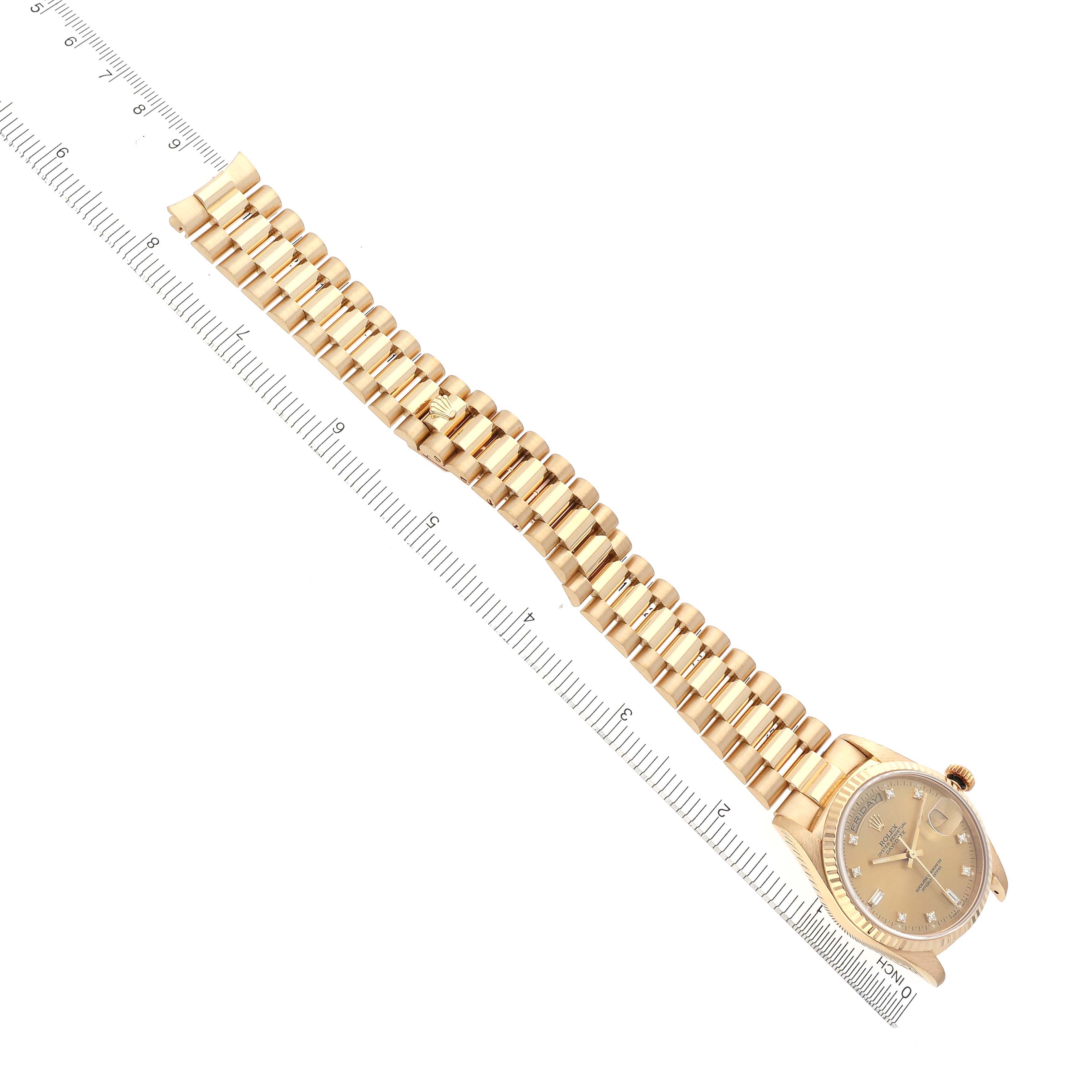 The Rolex President 18238 Men
s Yellow Gold Champagne Dial 18238 Men
s Yellow Gold Champagne Dial watch is shown at an angled top view, displaying its face and bracelet alongside a ruler.