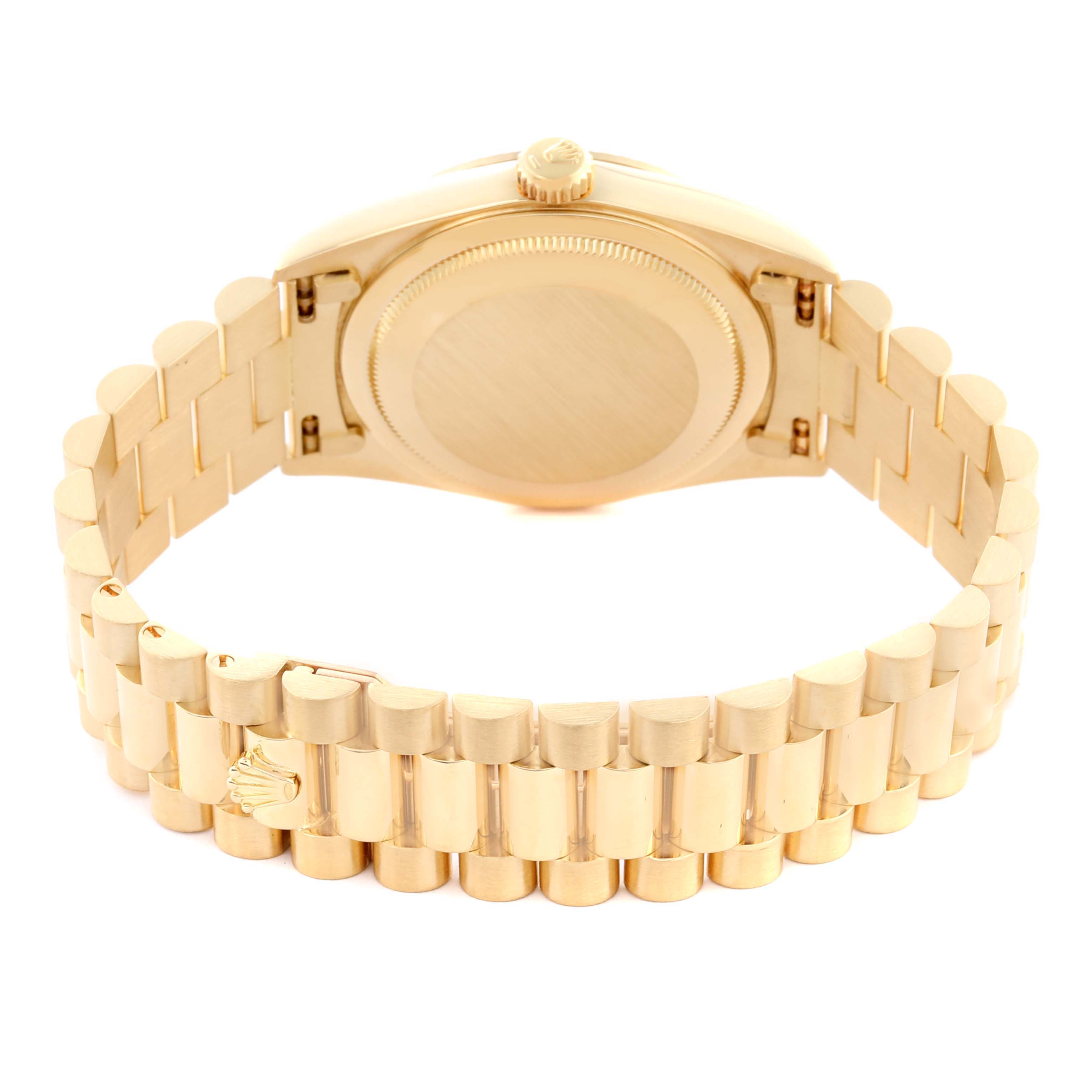 The image shows the back case and bracelet of a Rolex President 18238 Men
s Yellow Gold Champagne Dial 18238 Men
s Yellow Gold Champagne Dial model watch, viewed from behind.