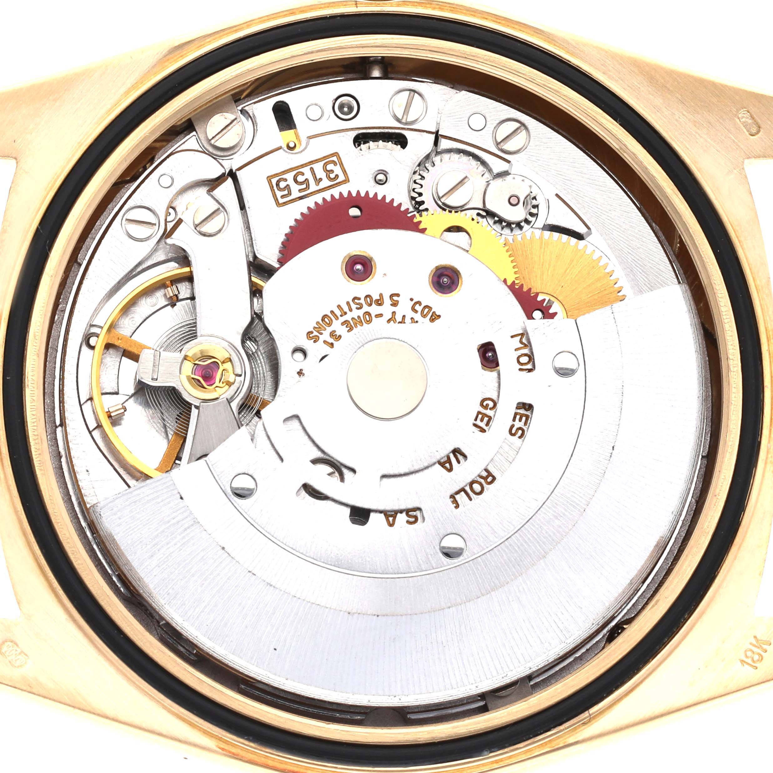 The image shows the internal mechanism of a Rolex President 18238 Men
s Yellow Gold Champagne Dial 18238 Men
s Yellow Gold Champagne Dial watch, highlighting gears and rotors.