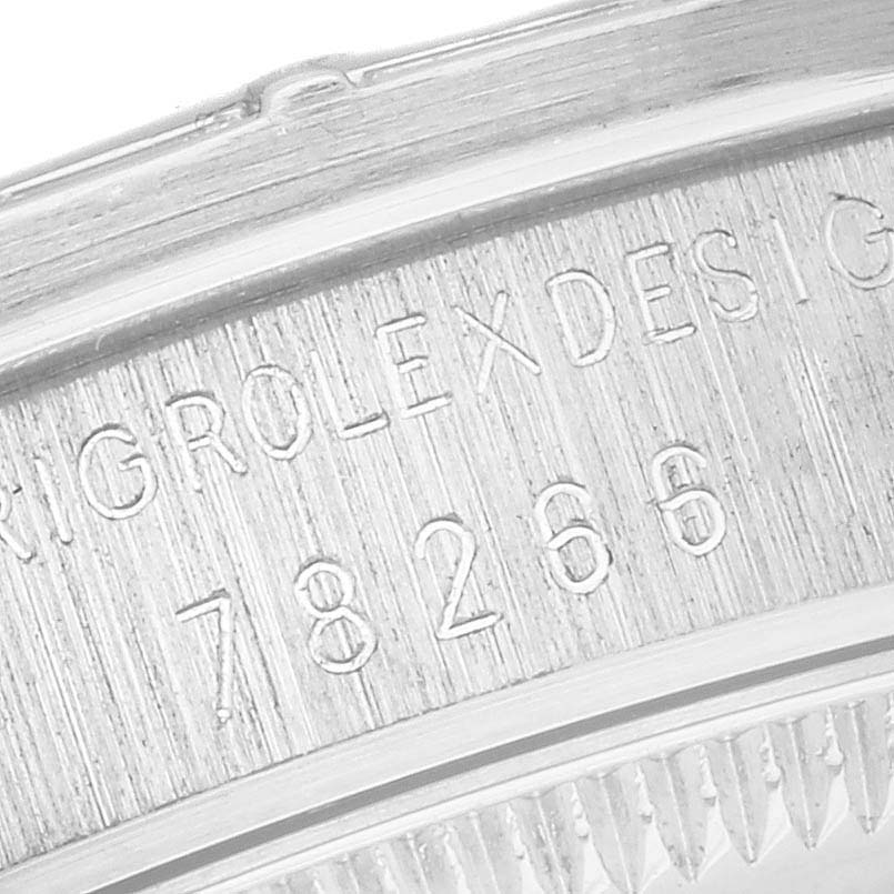 The image shows an angled close-up of the inner case engraving on a Rolex President 78266 Women's Platinum Mother of Pearl Dial 78266 Women's Platinum Mother of Pearl Dial model watch.