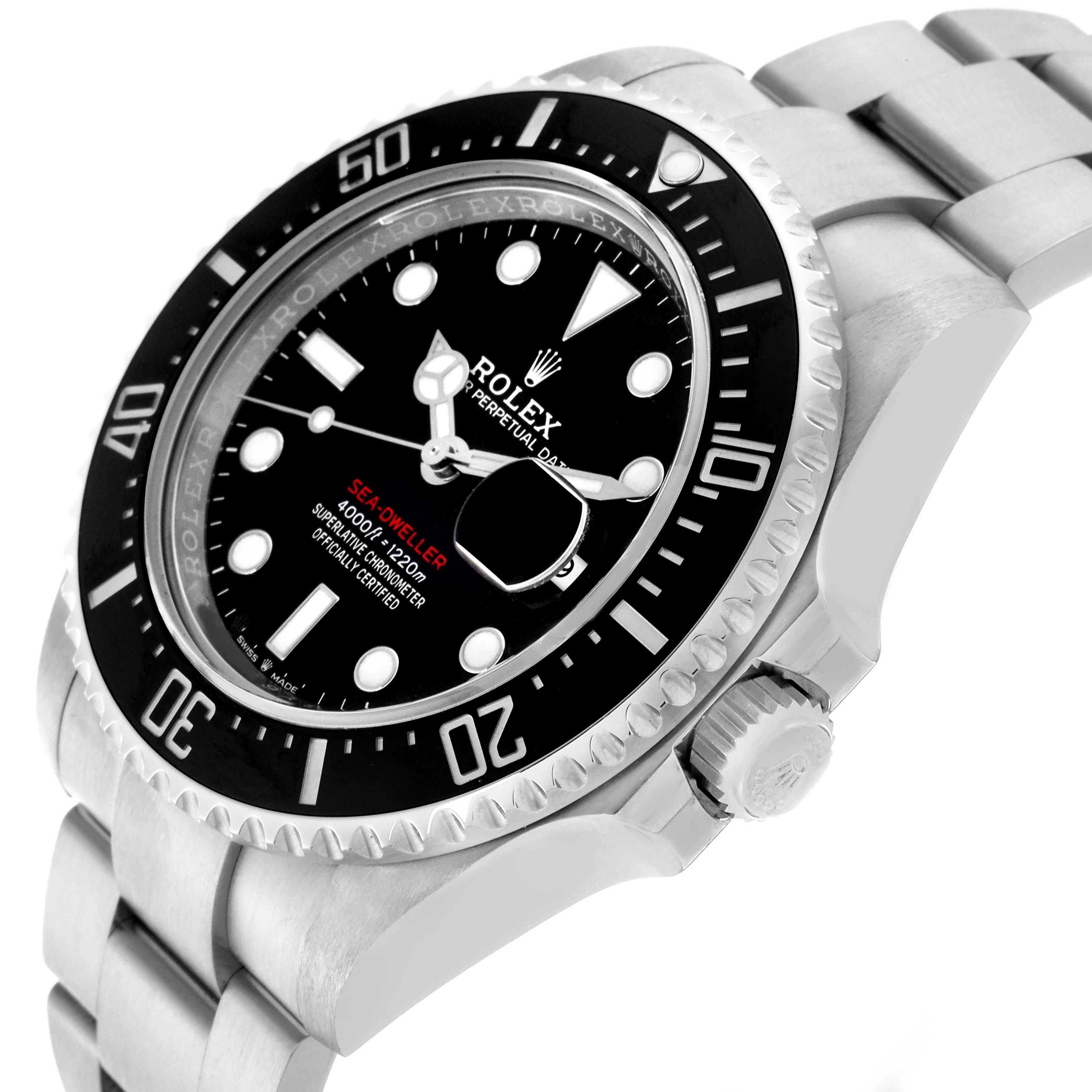 The Rolex Sea-Dweller 126600 Men's Stainless Steel Black Dial 126600 Men's Stainless Steel Black Dial watch is shown at an oblique angle, highlighting the face, bezel, crown, and bracelet.