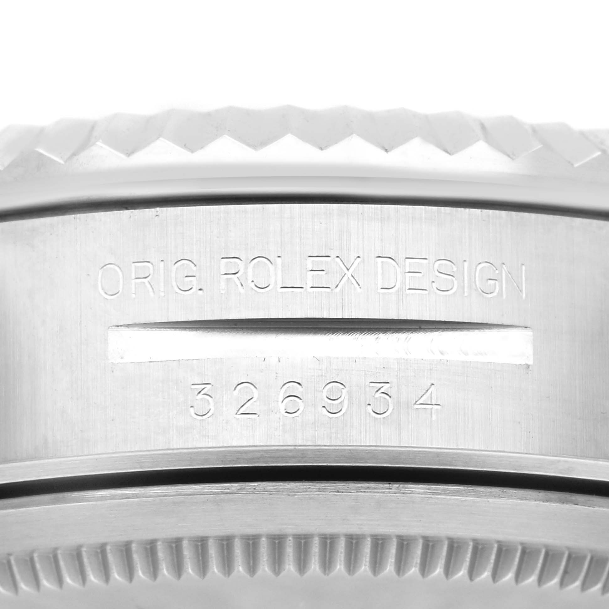 The image shows a close-up of the side case engraving on a Rolex Sky-Dweller 326934 Men's Stainless Steel Blue Dial 326934 Men's Stainless Steel Blue Dial with the design and model number.