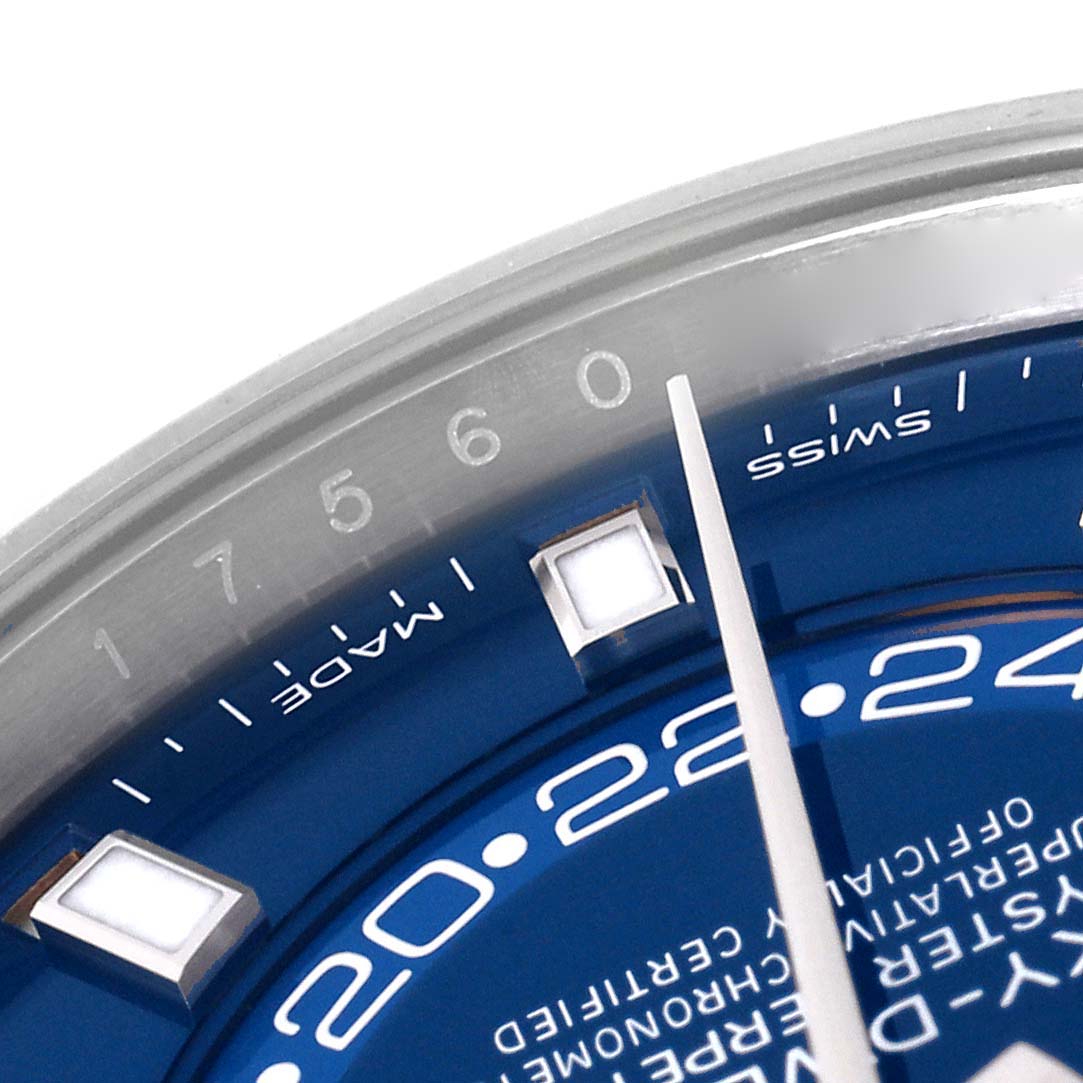 The image shows a close-up of the dial and part of the bezel of the Rolex Sky-Dweller 326934 Men's Stainless Steel Blue Dial 326934 Men's Stainless Steel Blue Dial, highlighting numbers and indices.