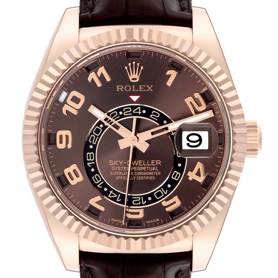 The image shows a frontal view of the Rolex Sky-Dweller watch, highlighting the bezel, dial, hands, and date display.