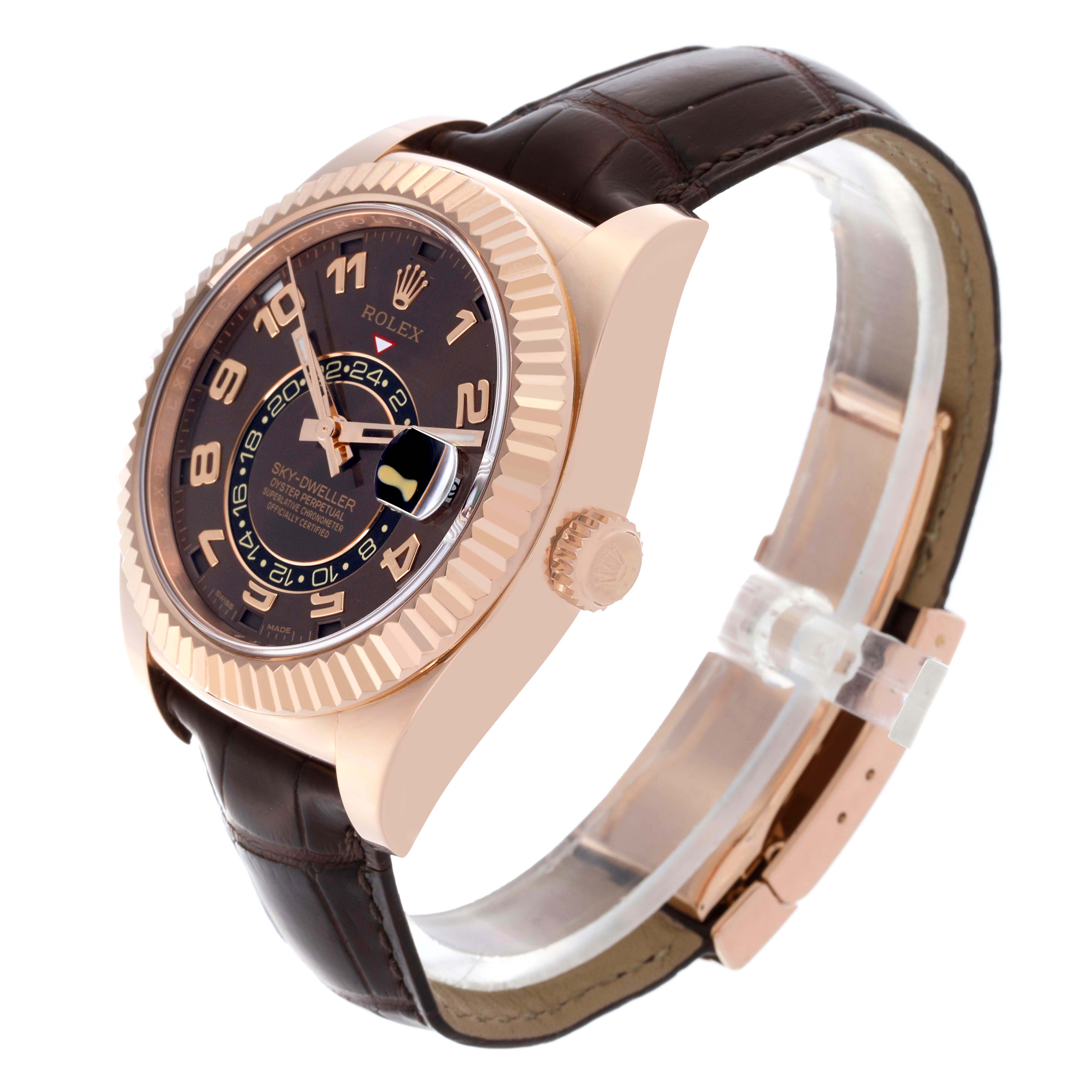 The Rolex Sky-Dweller 326135 Men
s Rose Gold Brown Dial 326135 Men
s Rose Gold Brown Dial is shown at a side angle, highlighting the face, bezel, crown, and leather strap.
