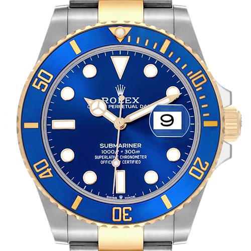 The Rolex Submariner watch is shown from the front, highlighting the blue dial, bezel, and two-tone bracelet.